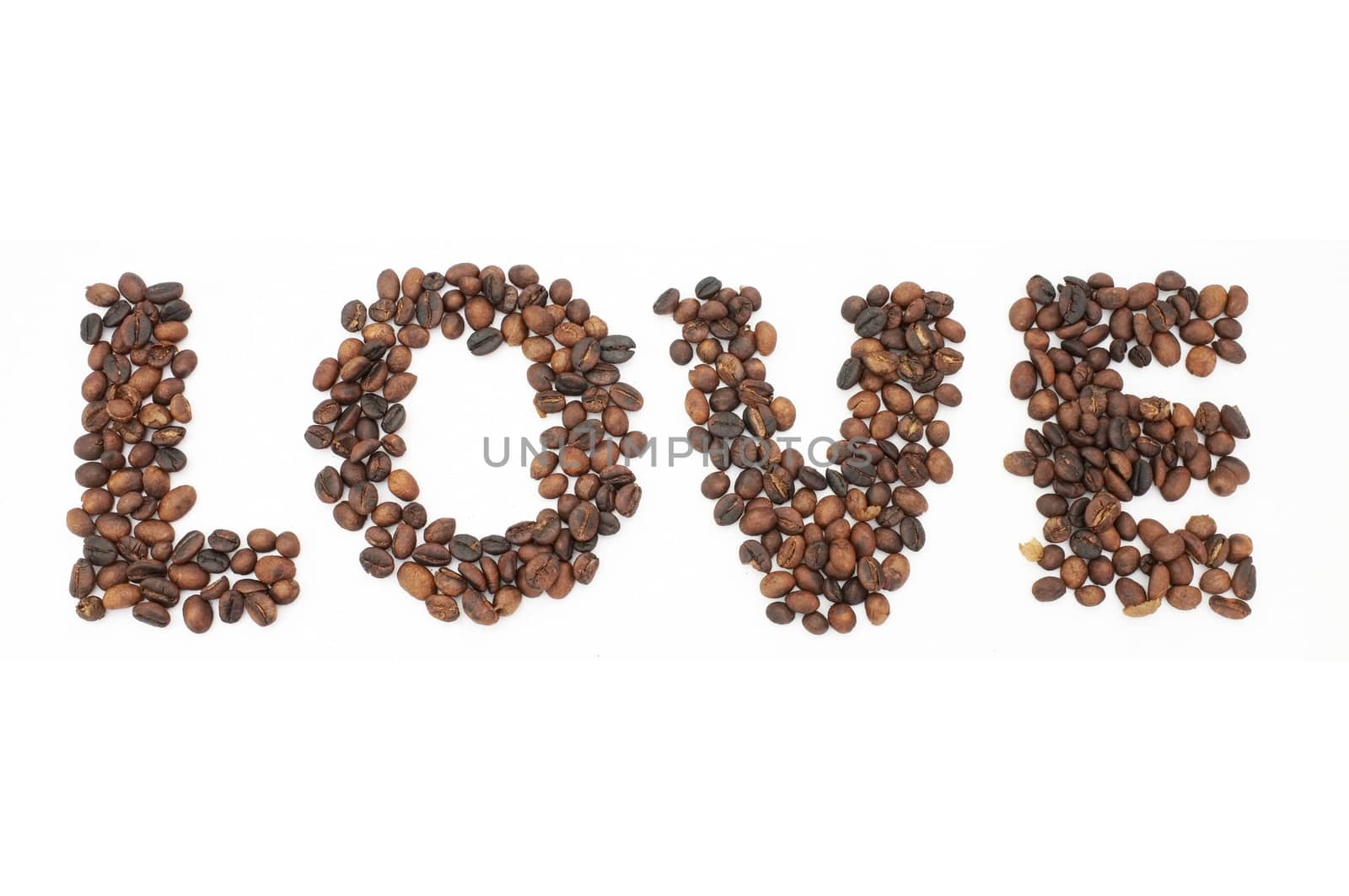 Roasted coffee beans in shape of alphabets, i love coffee by Hepjam