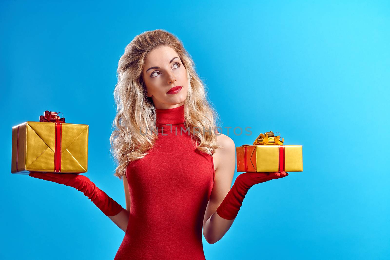 Woman portrait with gifts boxes smiling. Christmas by 918