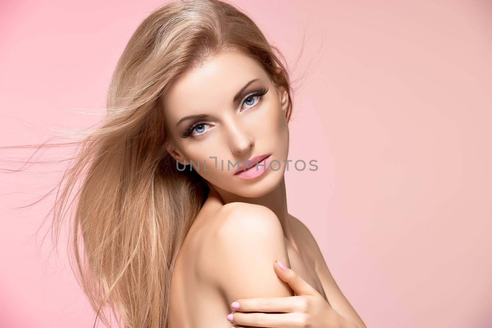 Beauty portrait nude woman, long eyelashes, perfect skin, natural makeup, fashion. Sensual attractive pretty blonde sexy model girl on pink, shiny straight hair. People face closeup, spa, copyspace