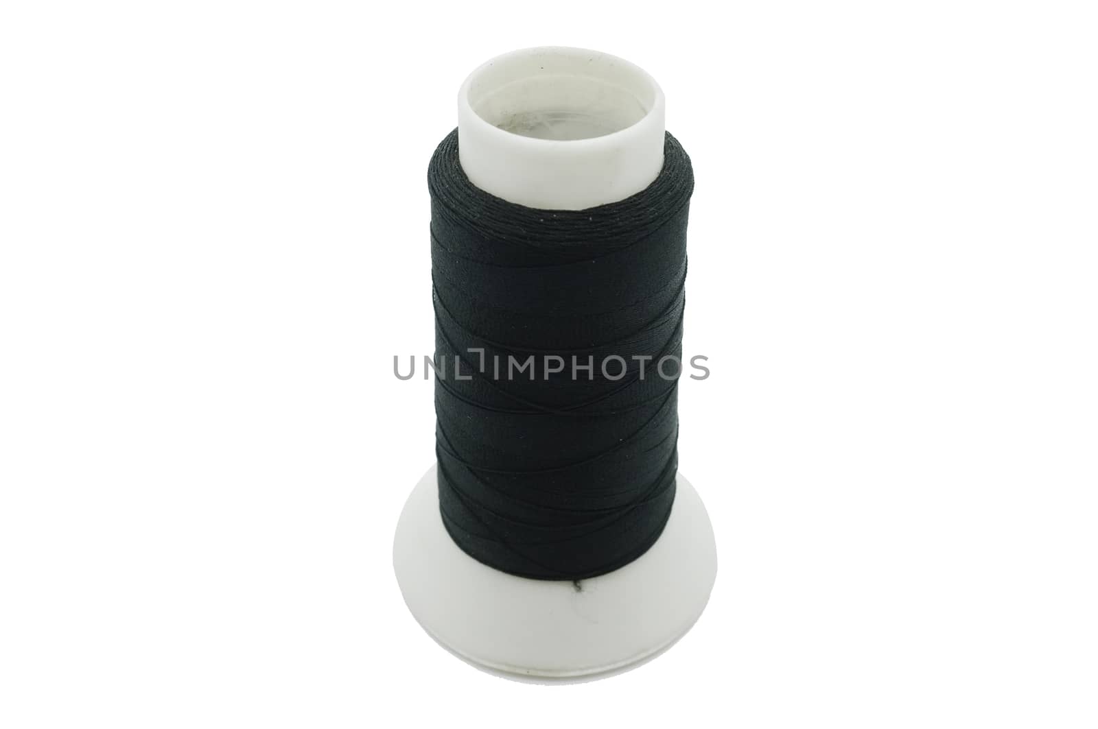 Black thread, yarn on few bobbin / spool isolated on white background