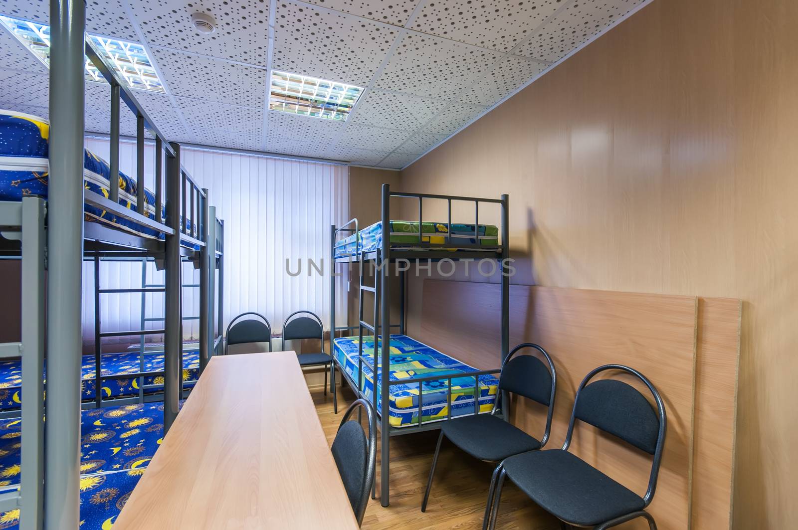 bunk metal beds in clean hostel room