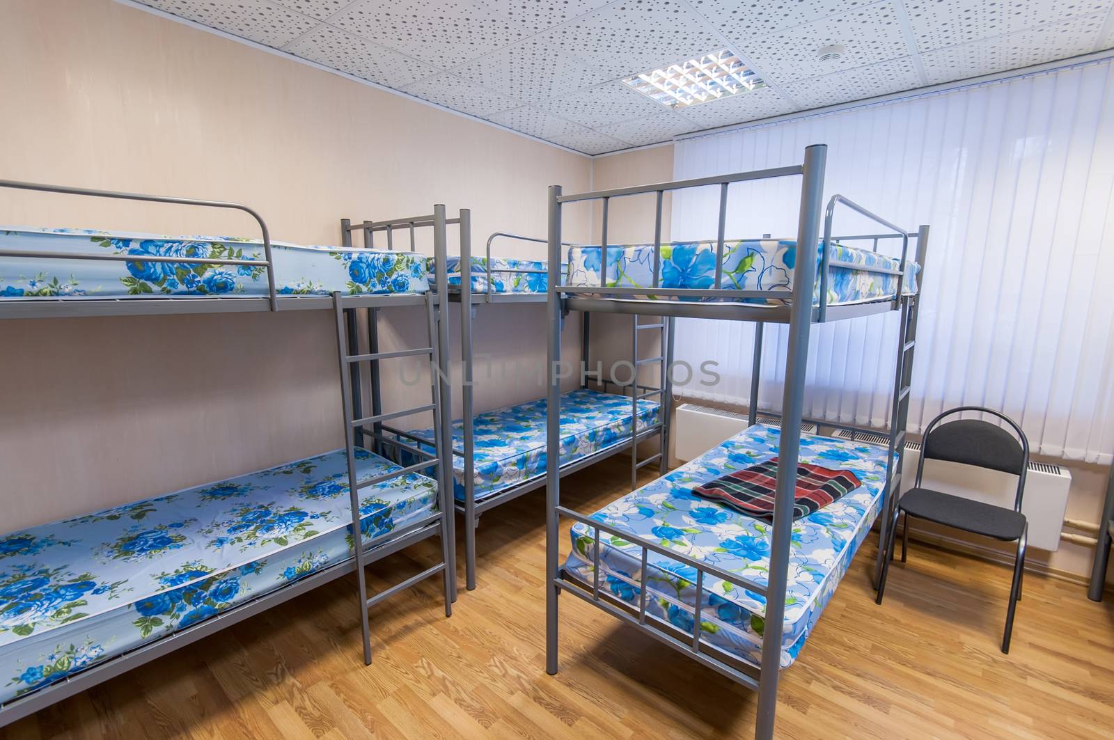 bunk metal beds in clean hostel room