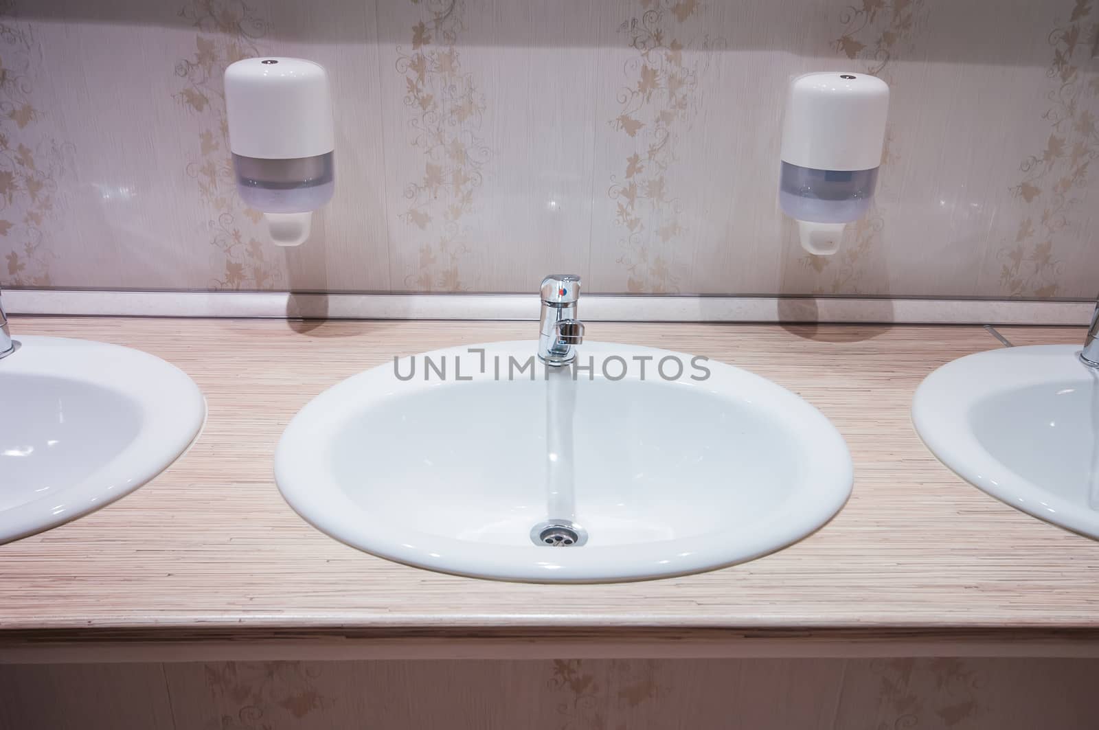 clean bathroom with sinks in the hostel