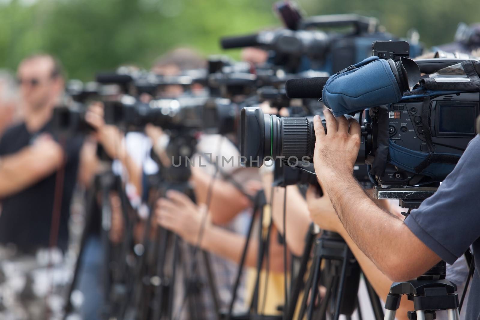 Press conference. Covering an event with a video camera.