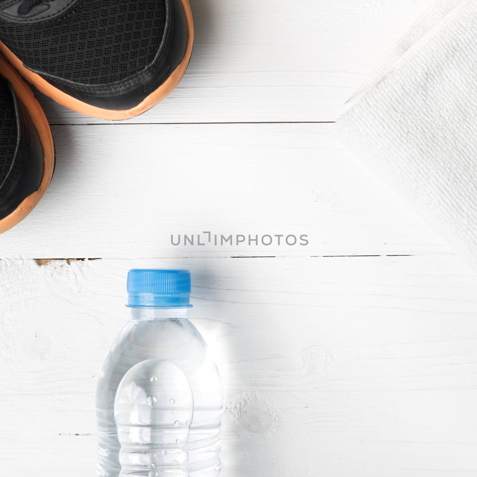 fitness equipment:running shoes,water bottle,towel