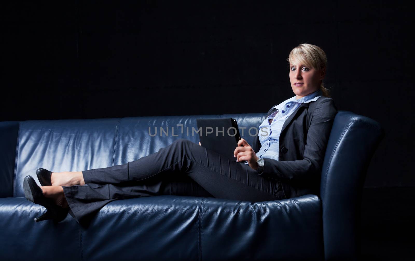 business woman on a couch