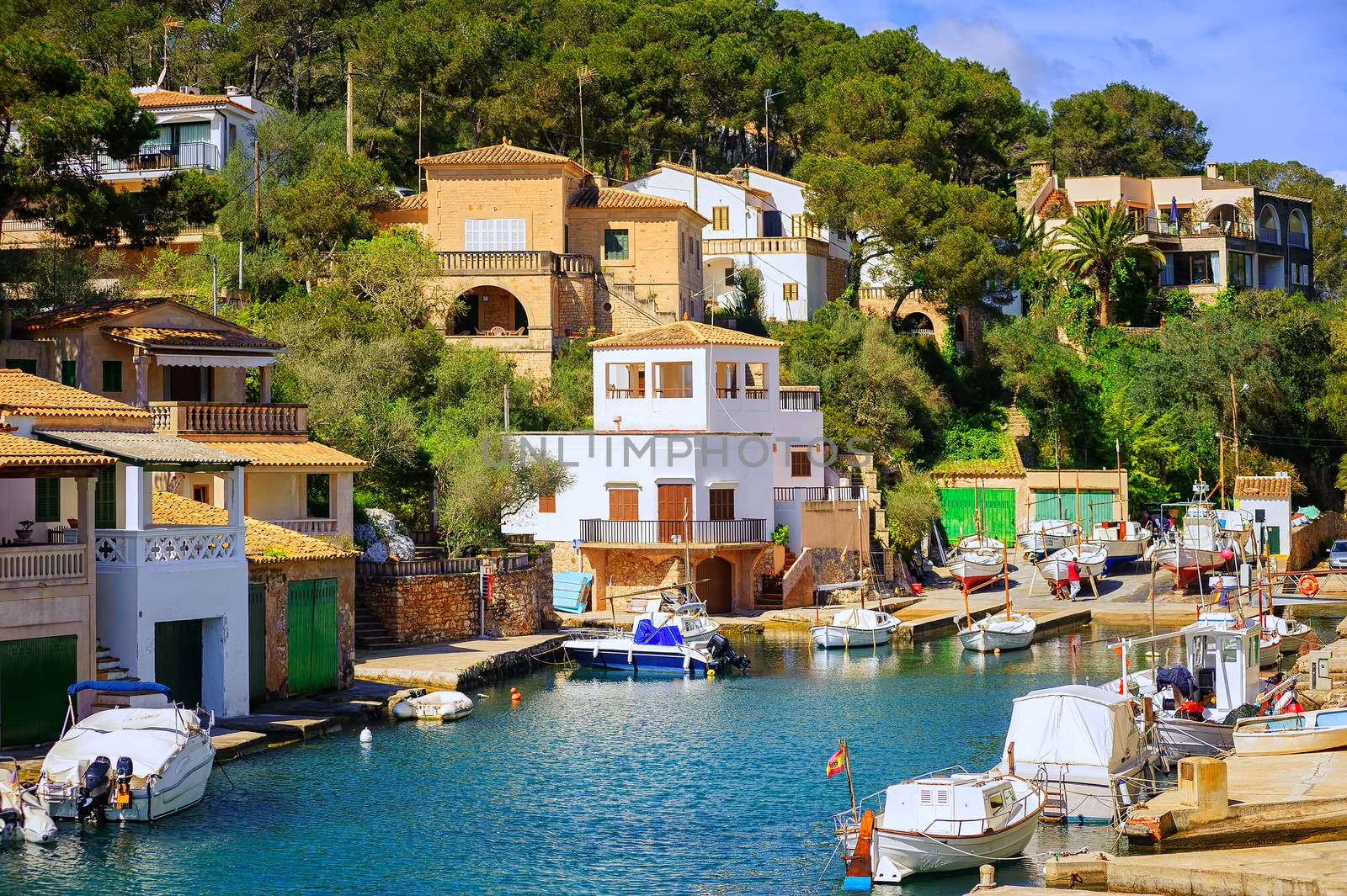 Little fishermen town on Mallorca island in Mediterranean sea, Spain by GlobePhotos