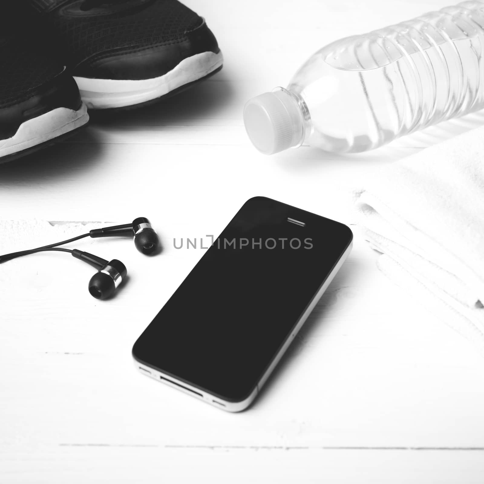 fitness eqiupment:running shoes,water bottle,towel,smart phone black and white color style