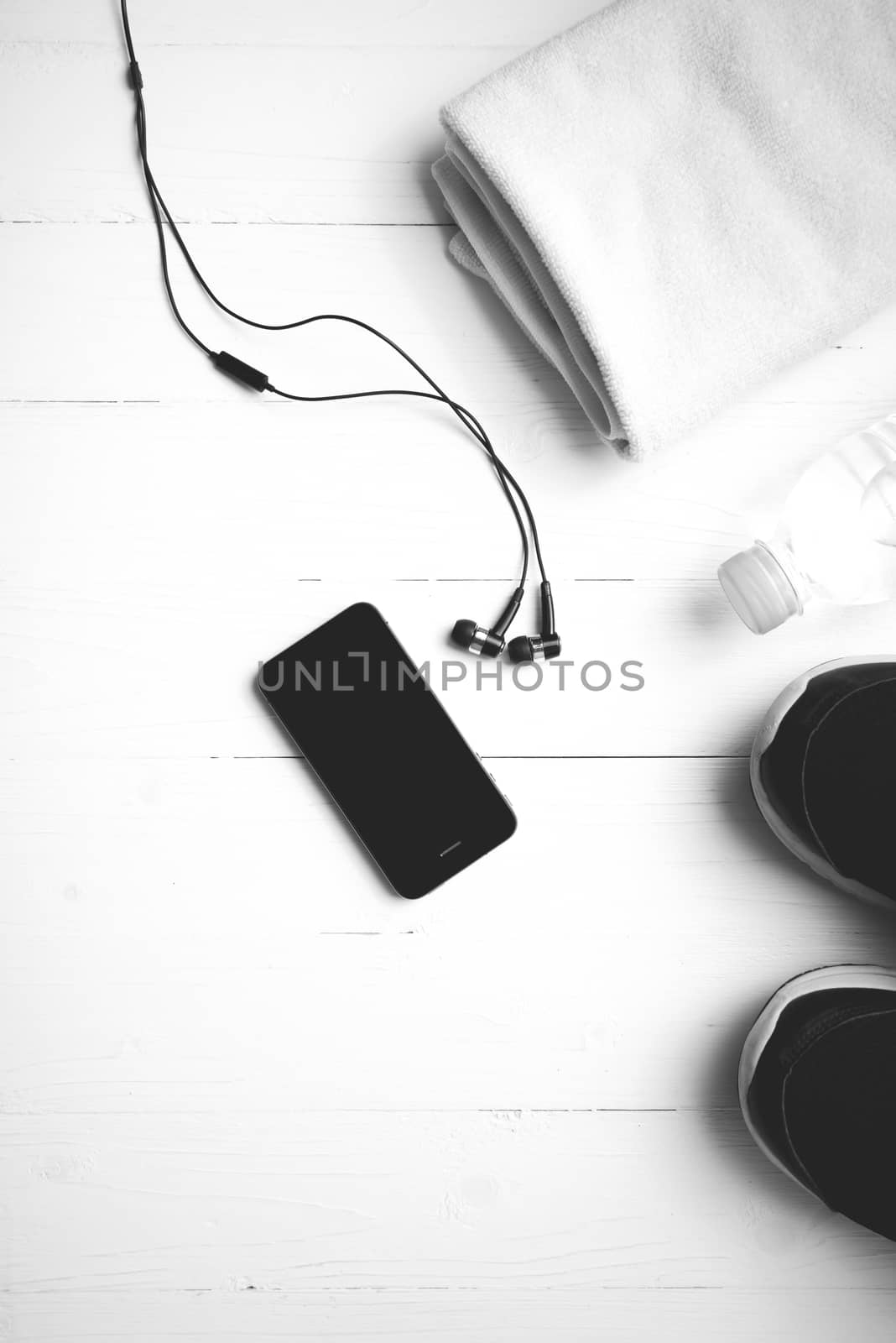 fitness equipment:running shoes,water bottle,towel,smart phone black and white color style