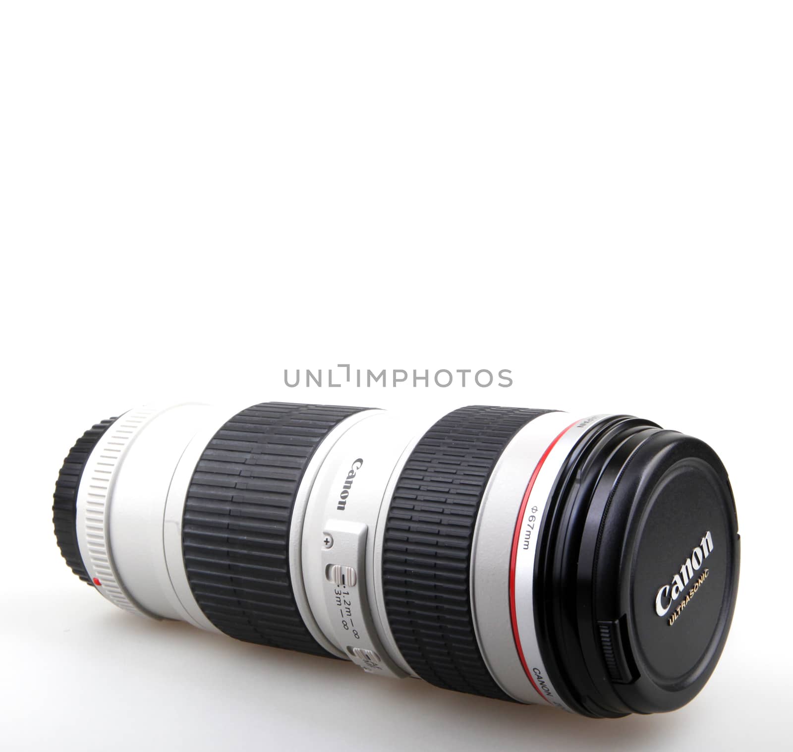 AYTOS, BULGARIA - DECEMBER 11, 2015: Canon EF 70-200mm f/4L USM Lens. Canon Inc. is a Japanese multinational corporation specialized in the manufacture of imaging and optical products. by nenov