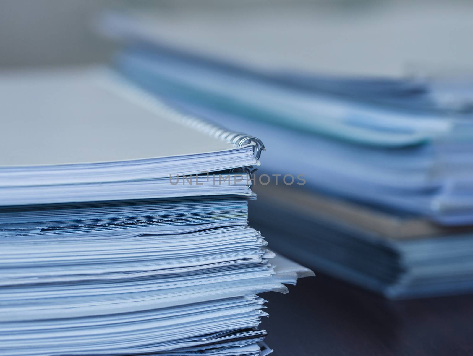 Accounting and taxes. Large pile of magazine and books closeup