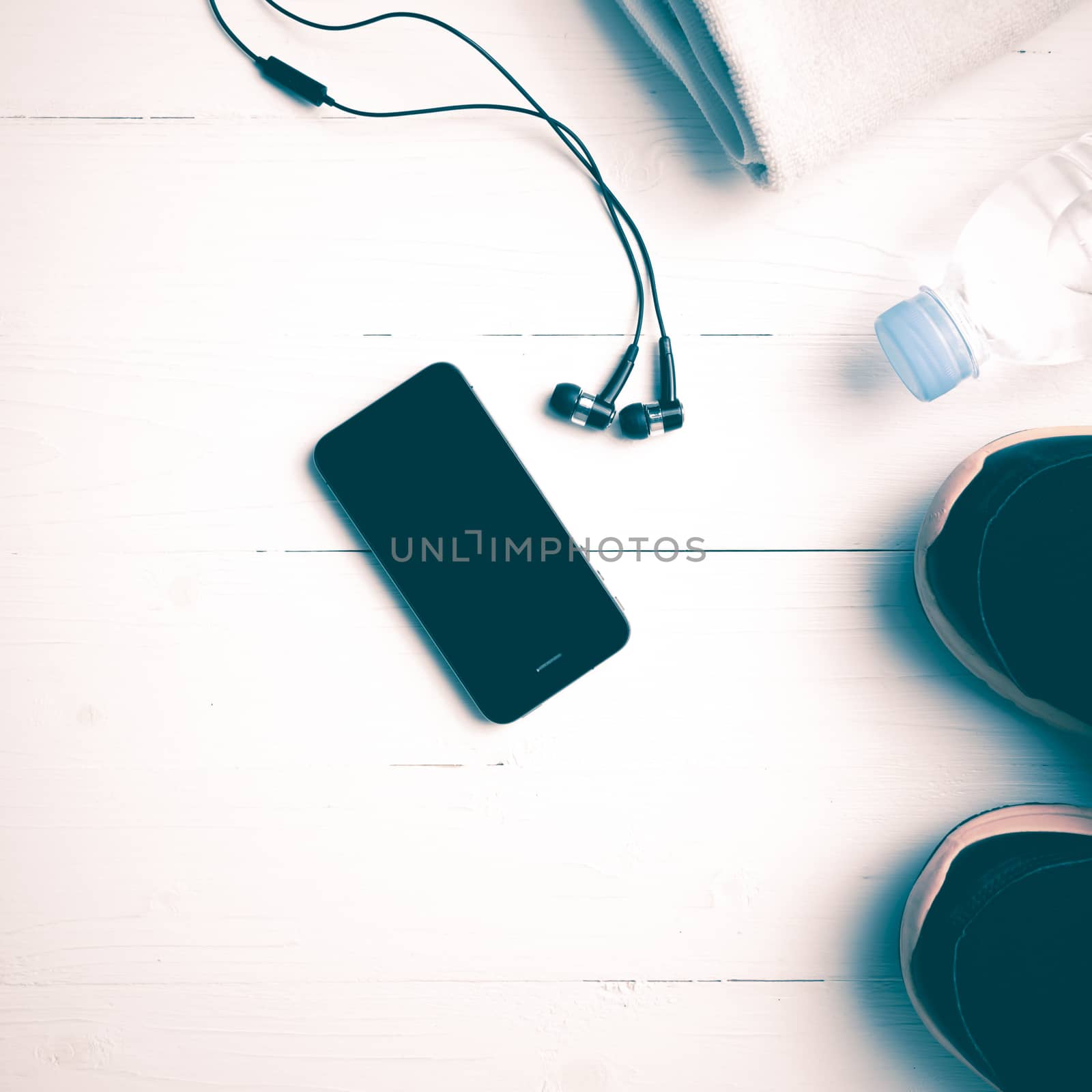 fitness equipment:running shoes,water bottle,towel,smart phone vintage style