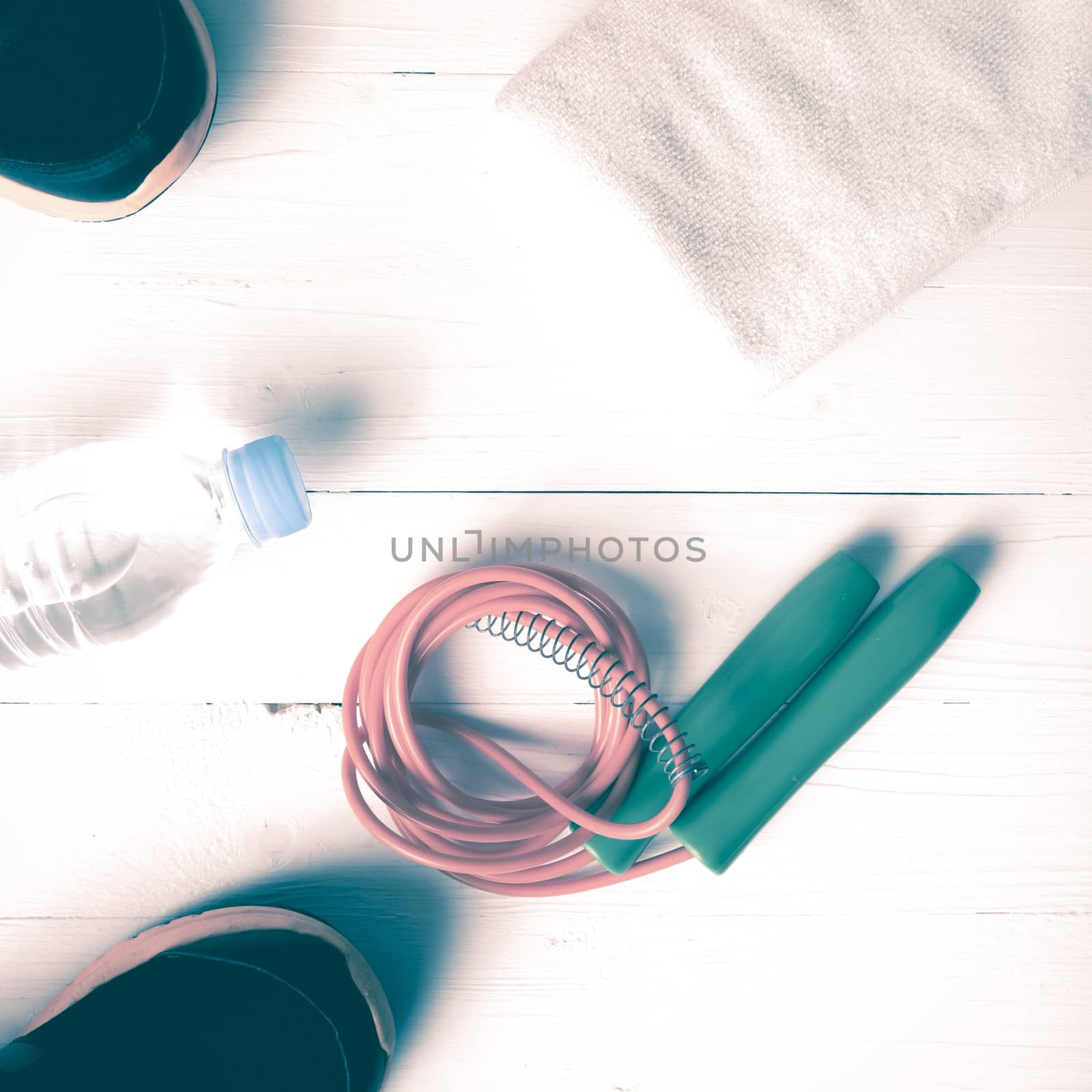 fitness equipment:running shoes,water bottle,towel,rope vintage style