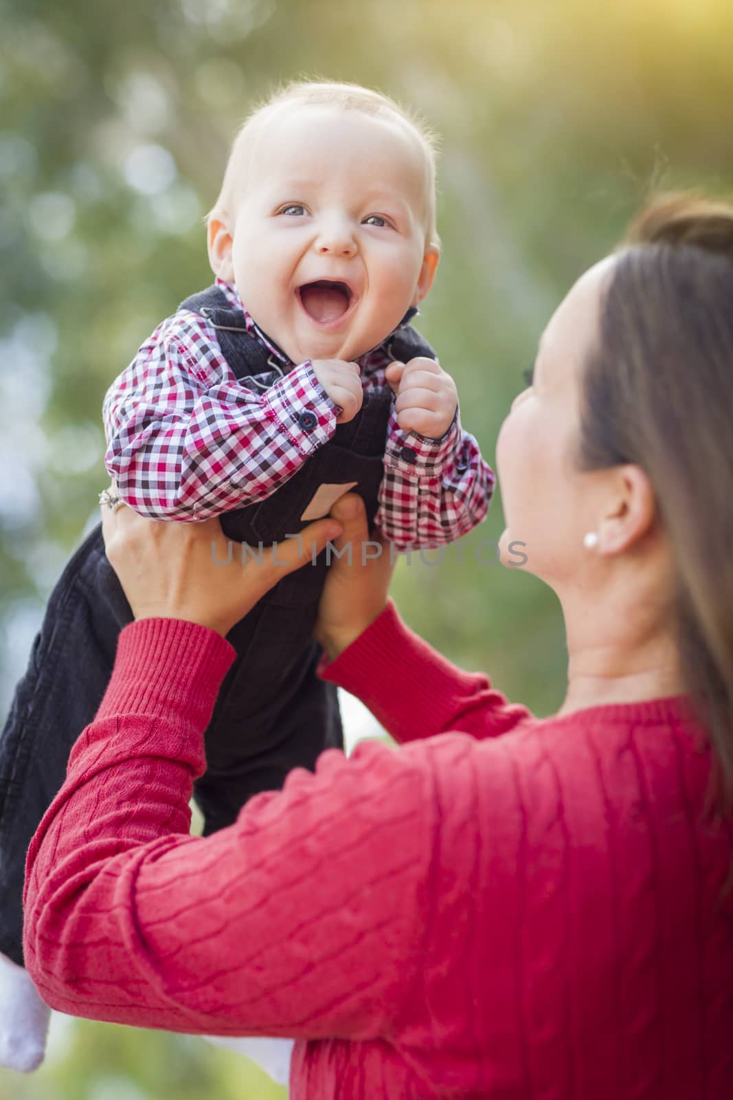 Little Baby Boy Having Fun With Mommy Outdoors by Feverpitched