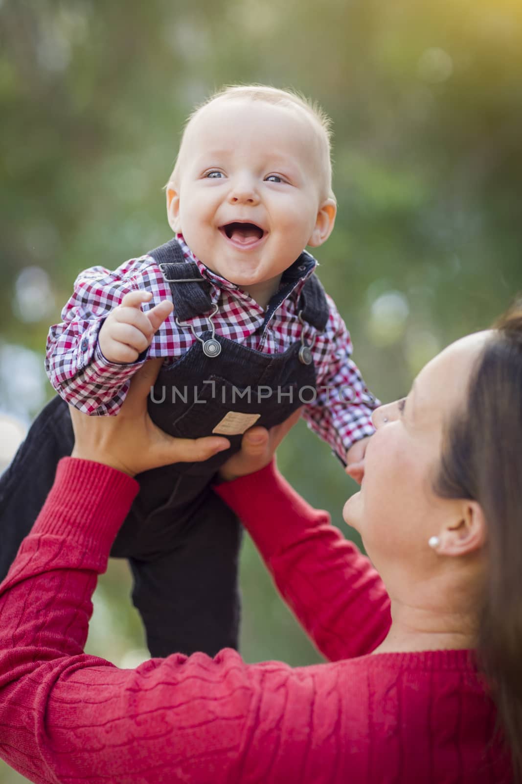 Cute Little Baby Boy Having Fun With Mommy Outdoors.