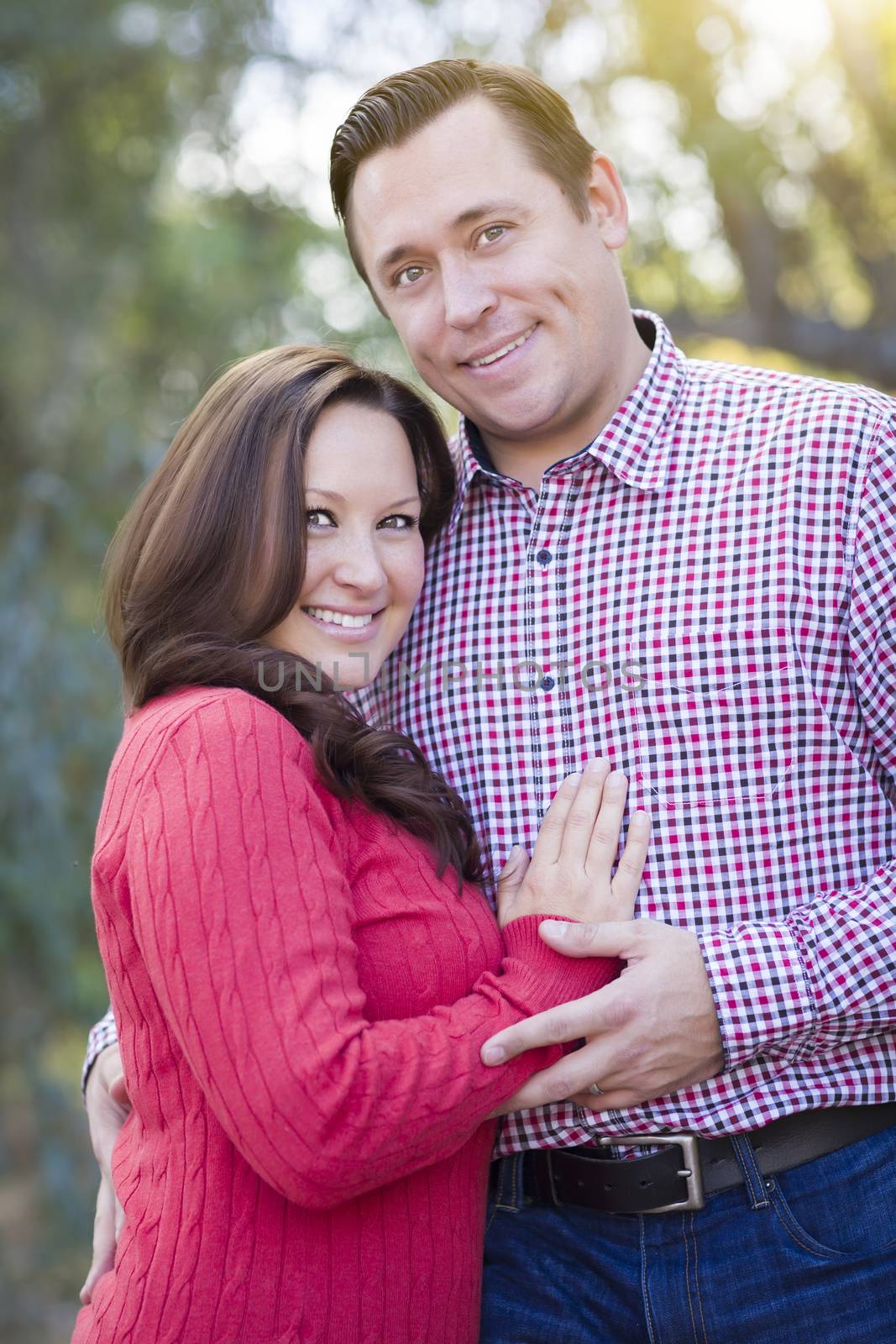 Attractive Caucasian Couple Portrait Outdoors by Feverpitched