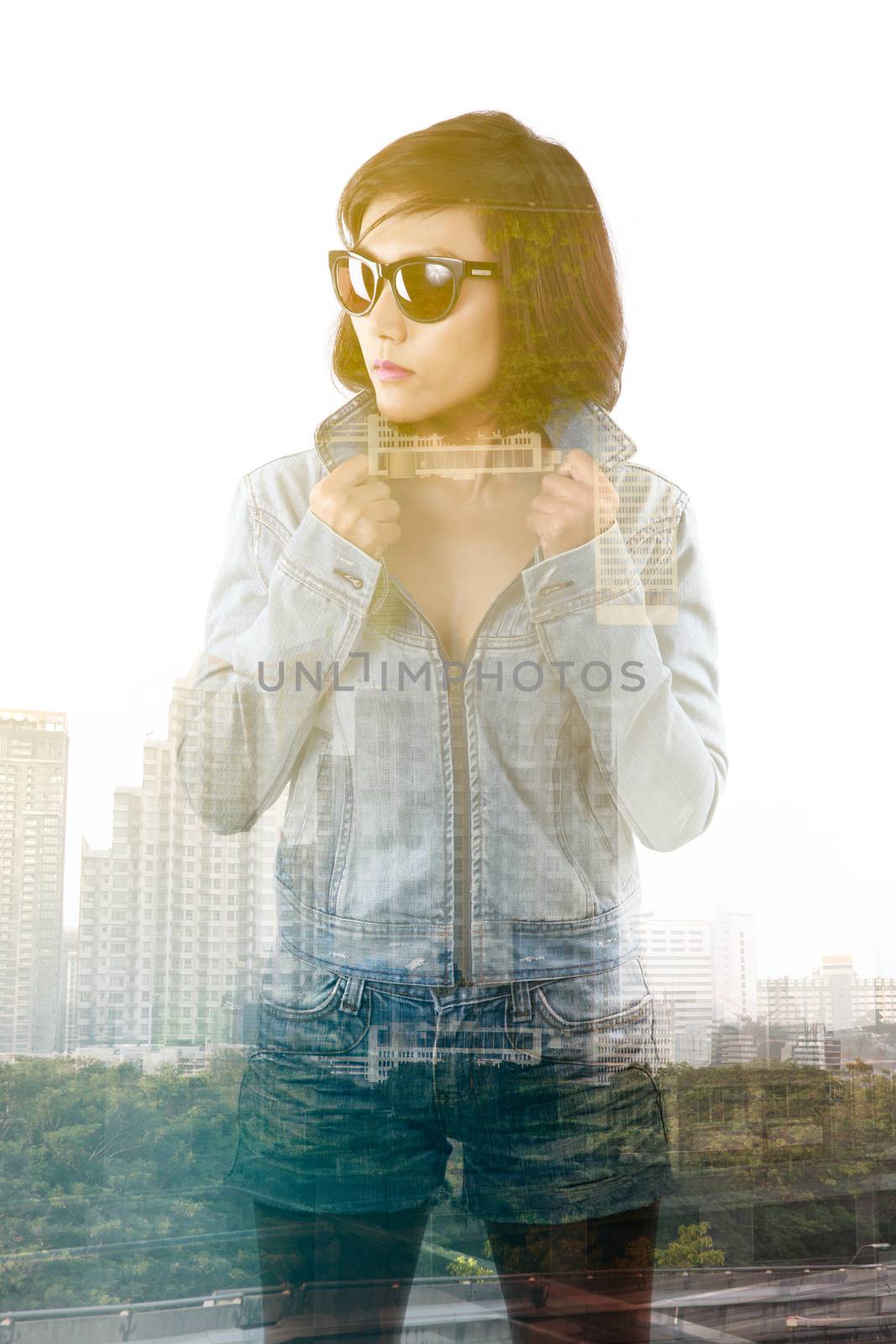 Double exposure of Asian lady and building skyscraper - lifestyle in city concept