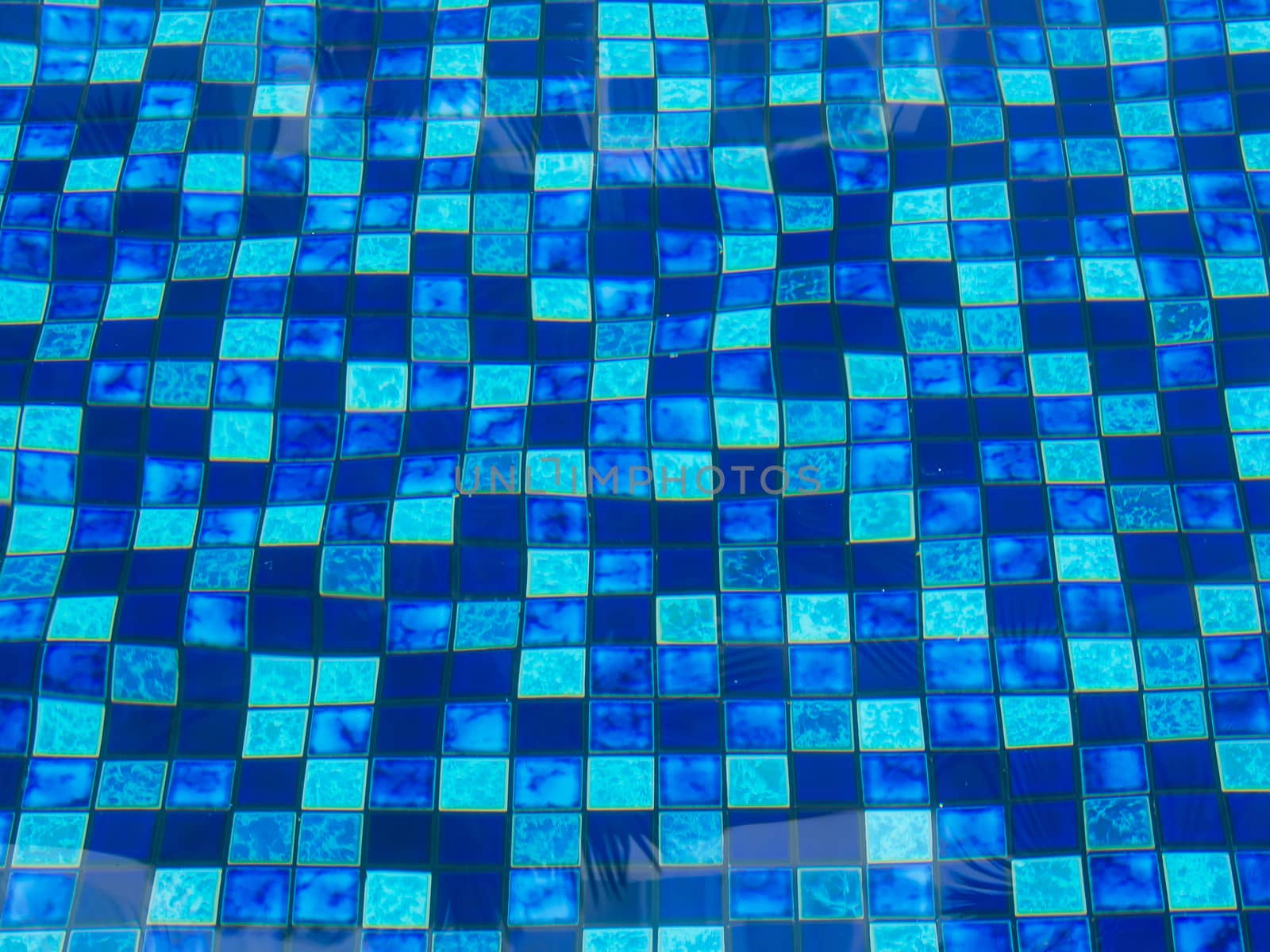 pattern of blue tiles in swimming pool