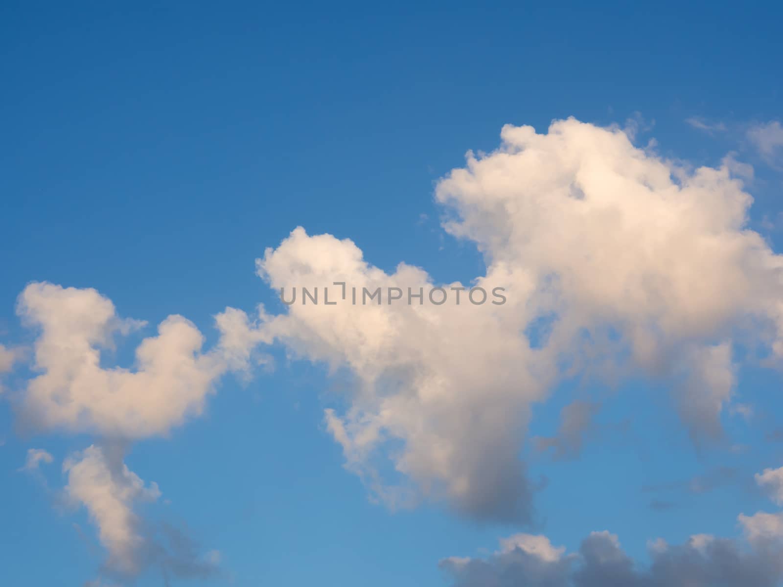 big cloud in blue sky in the morning of winter