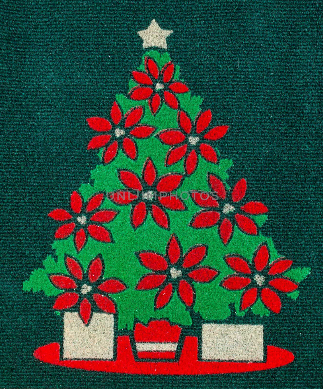 christmas tree carpet on green background