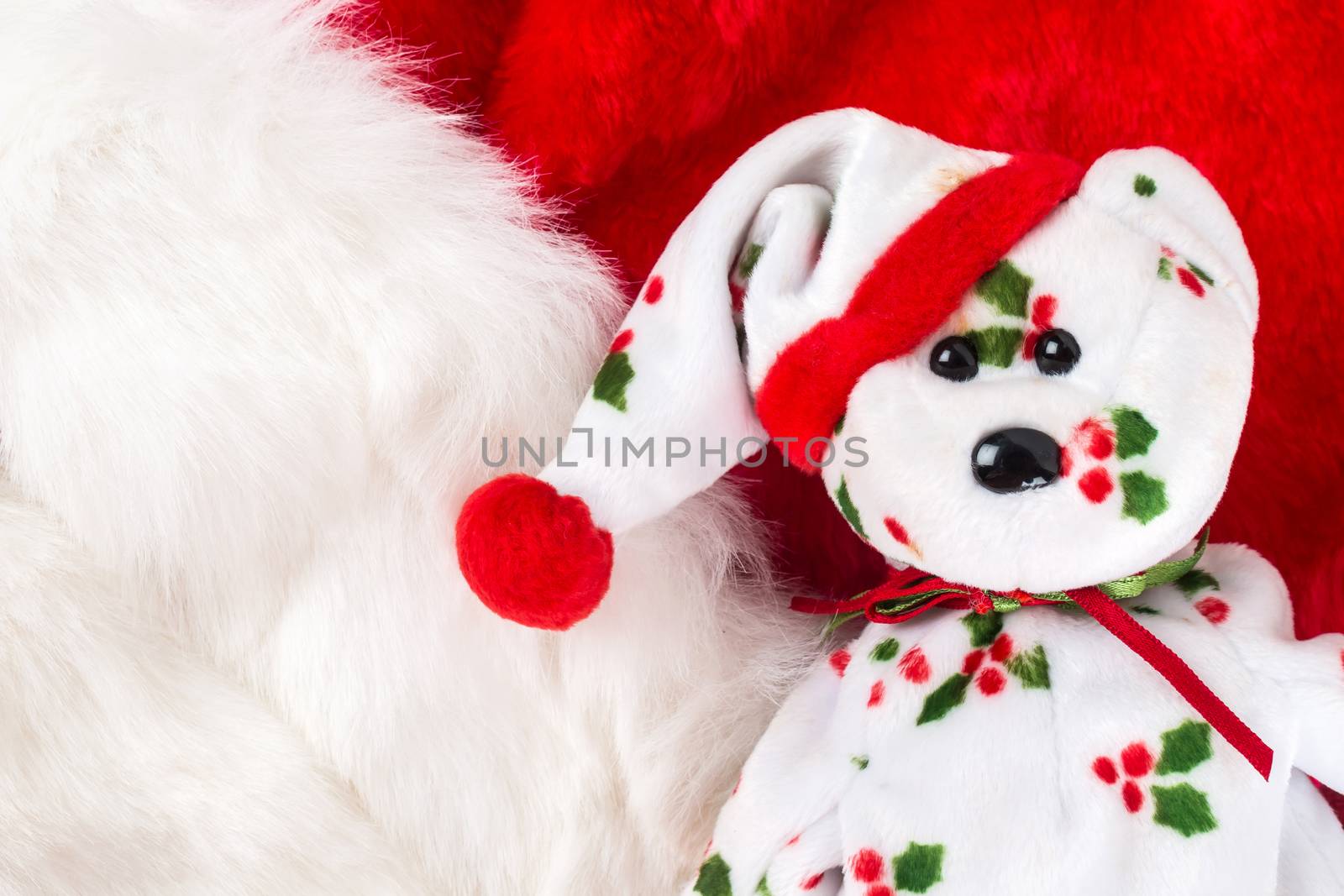 Christmas bear on white and red fur