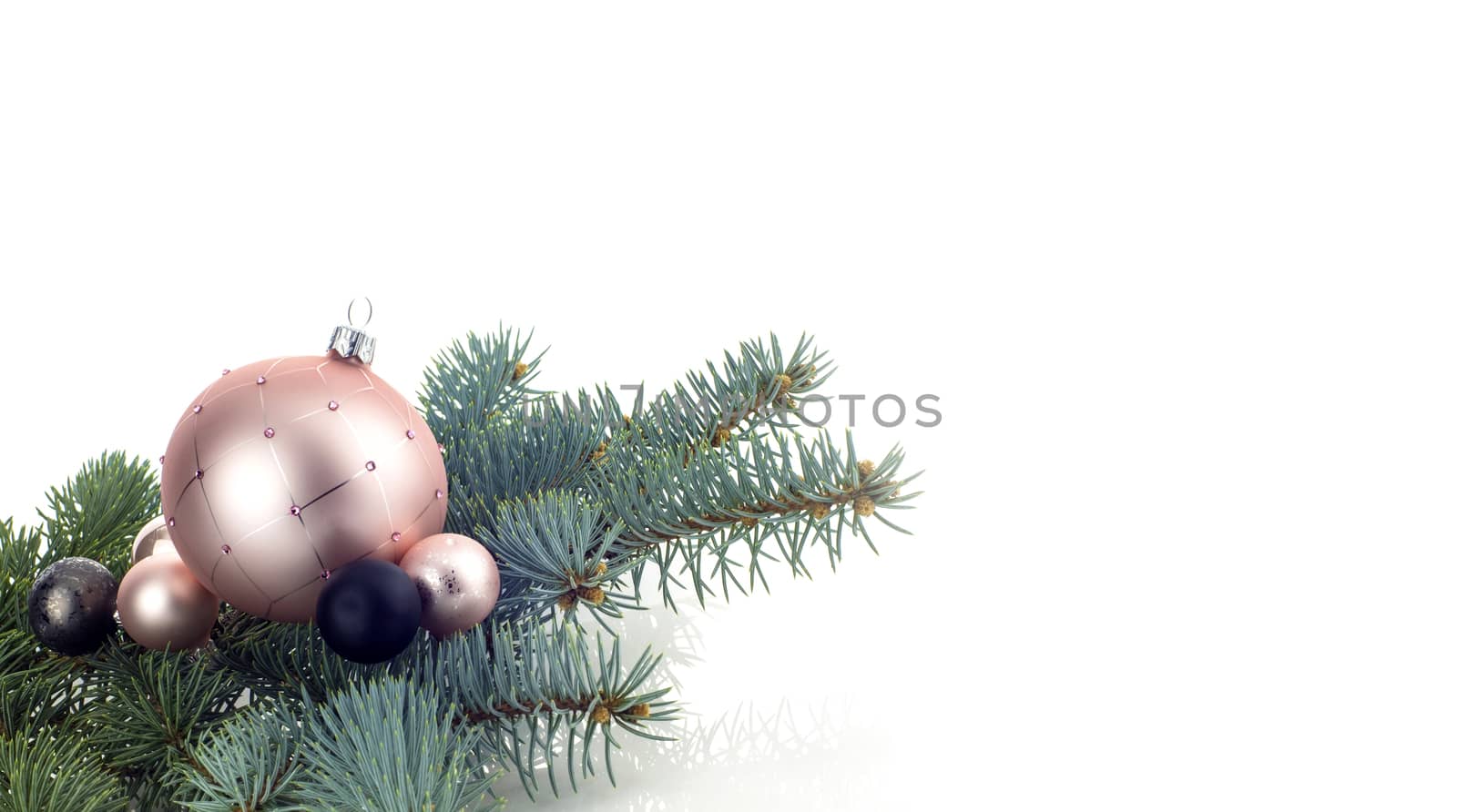 Christmas decoration with ball ornaments over white background