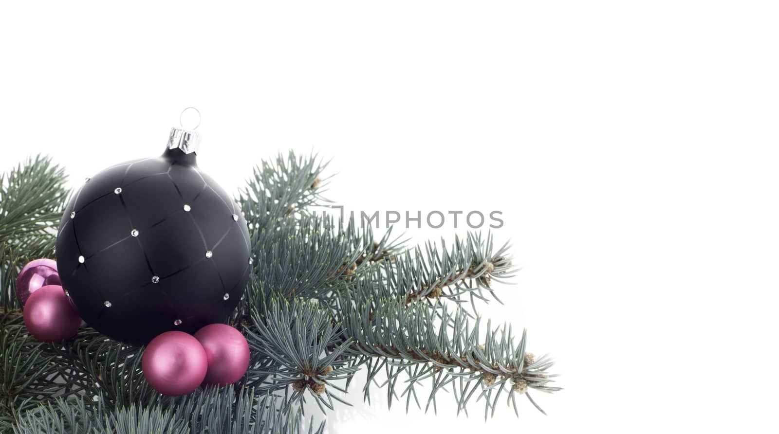 Christmas decoration with ball ornaments over white background