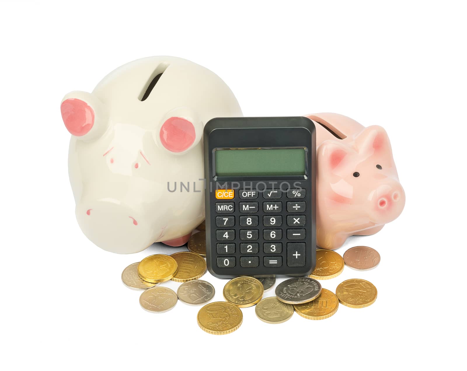 Piggy banks with coins and calculator on isolated white background