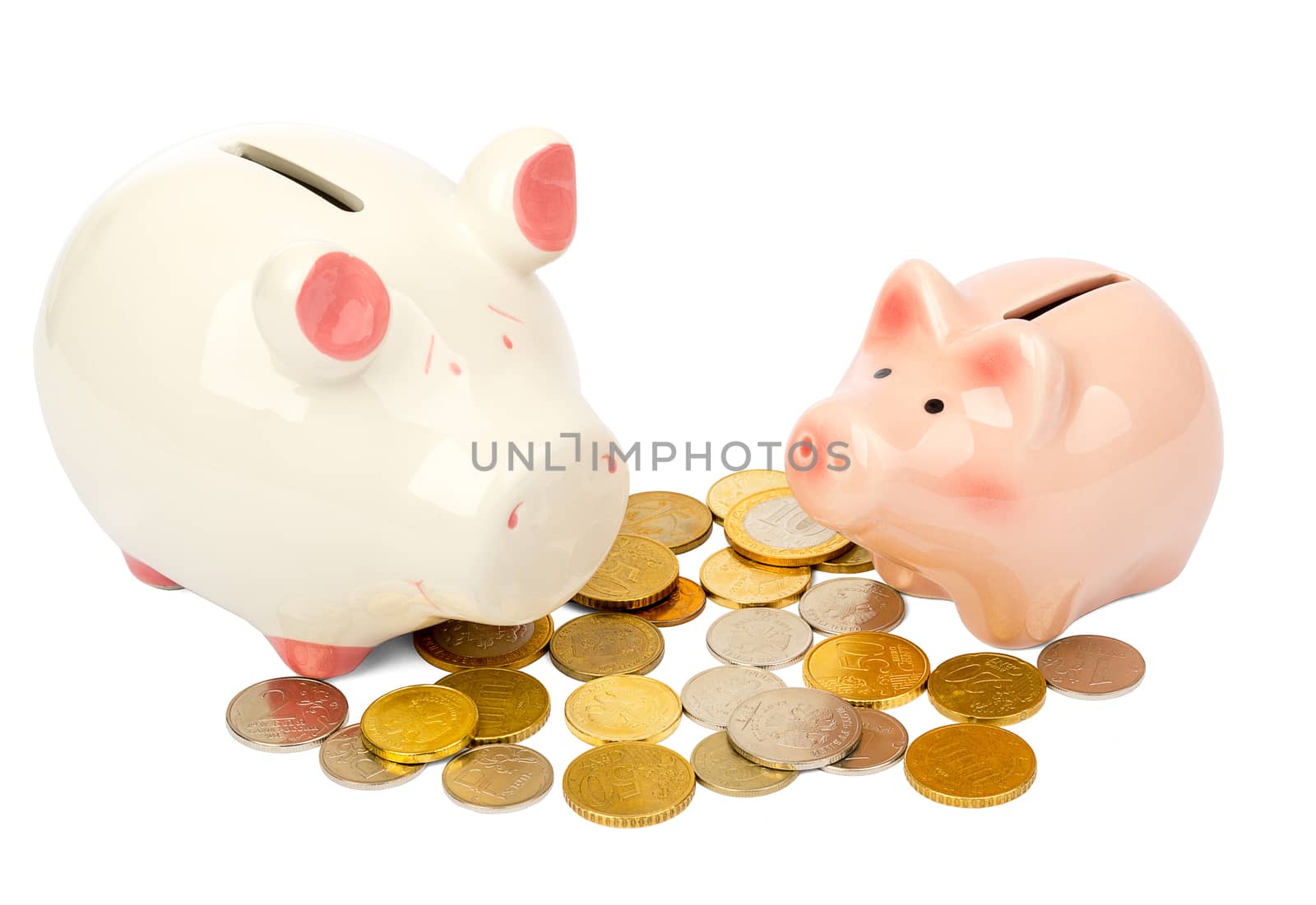 Piggy banks with coins on isolated white background