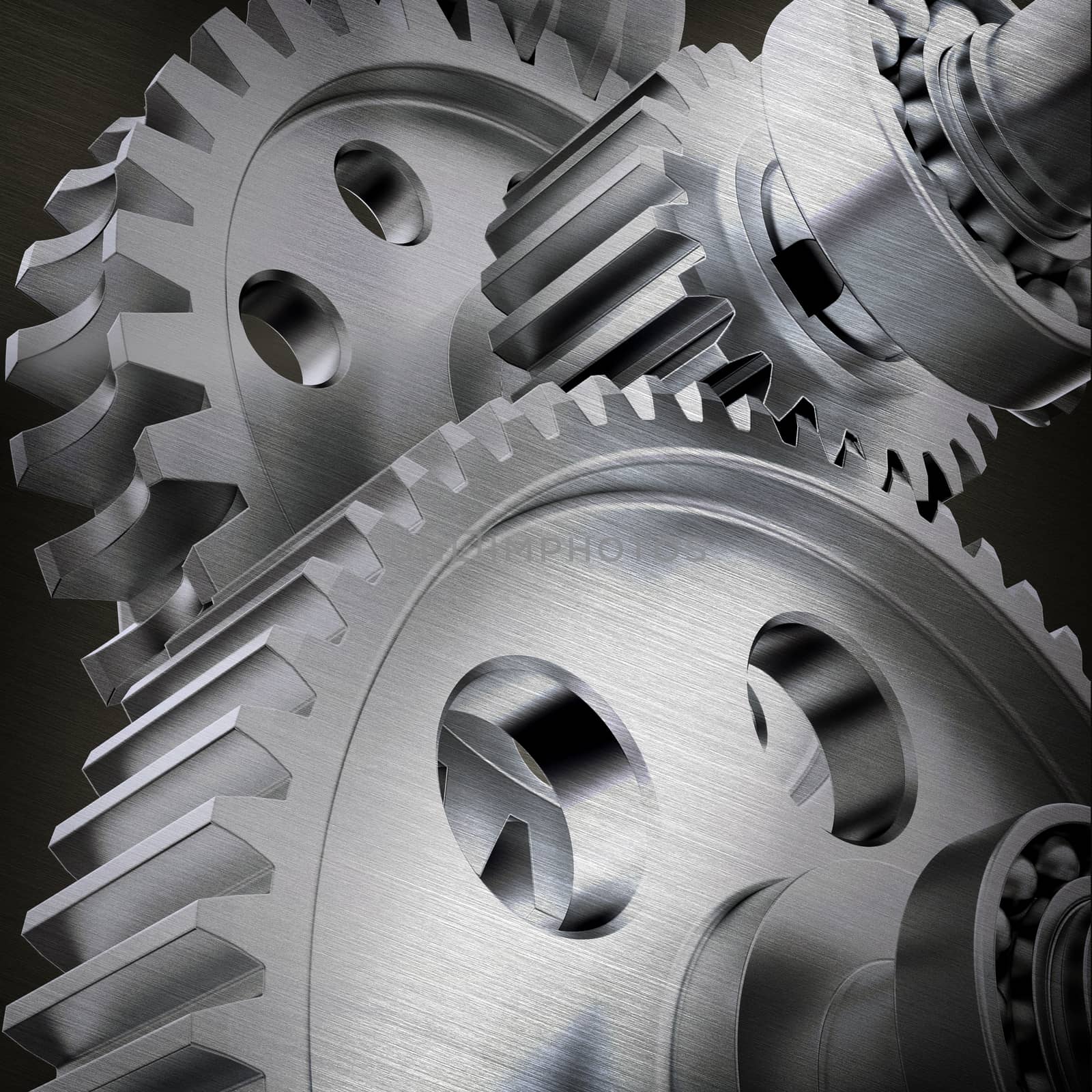 Metal cog gears joining together, close up view