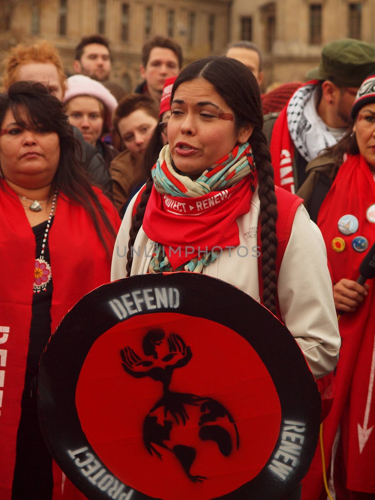 FRANCE, Paris : Indigenous people organizations demonstrate in Paris Pont des Arts on December 12, 2015 as COP 21 negotiations come to an end. 