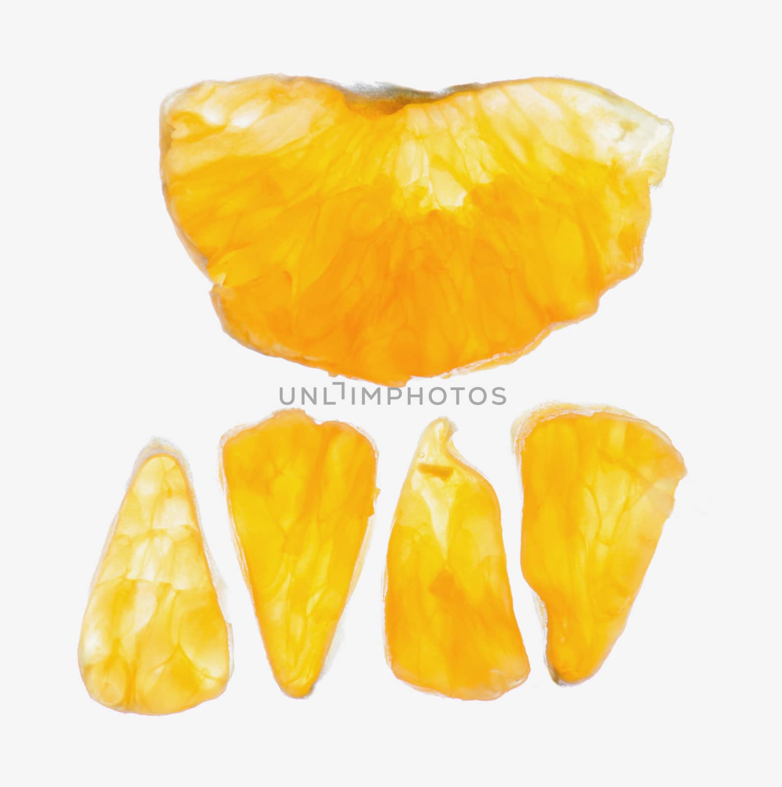 Macro of Mandarines triangle slices on white background