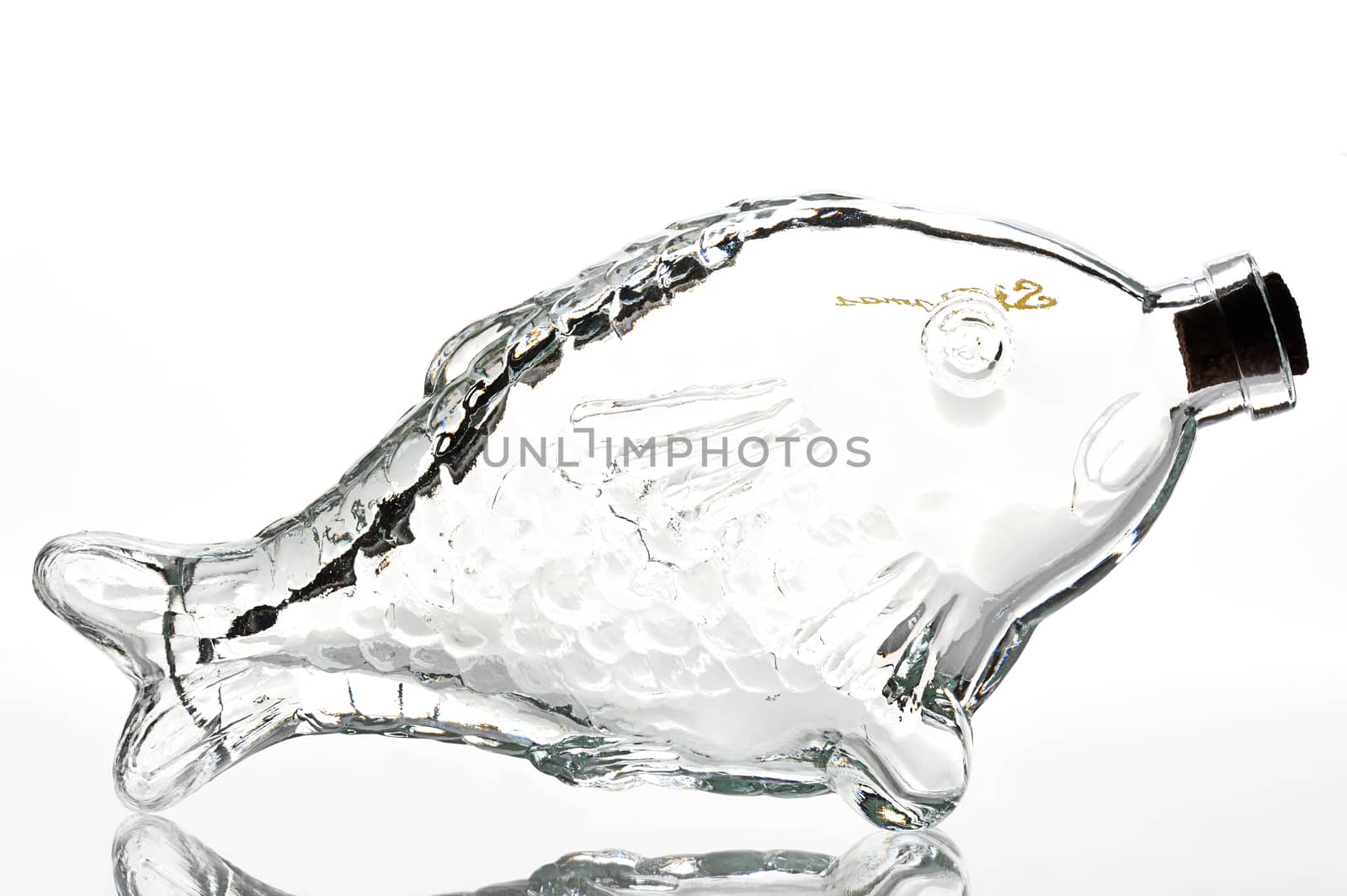 Empty fish shape bottle on a white background