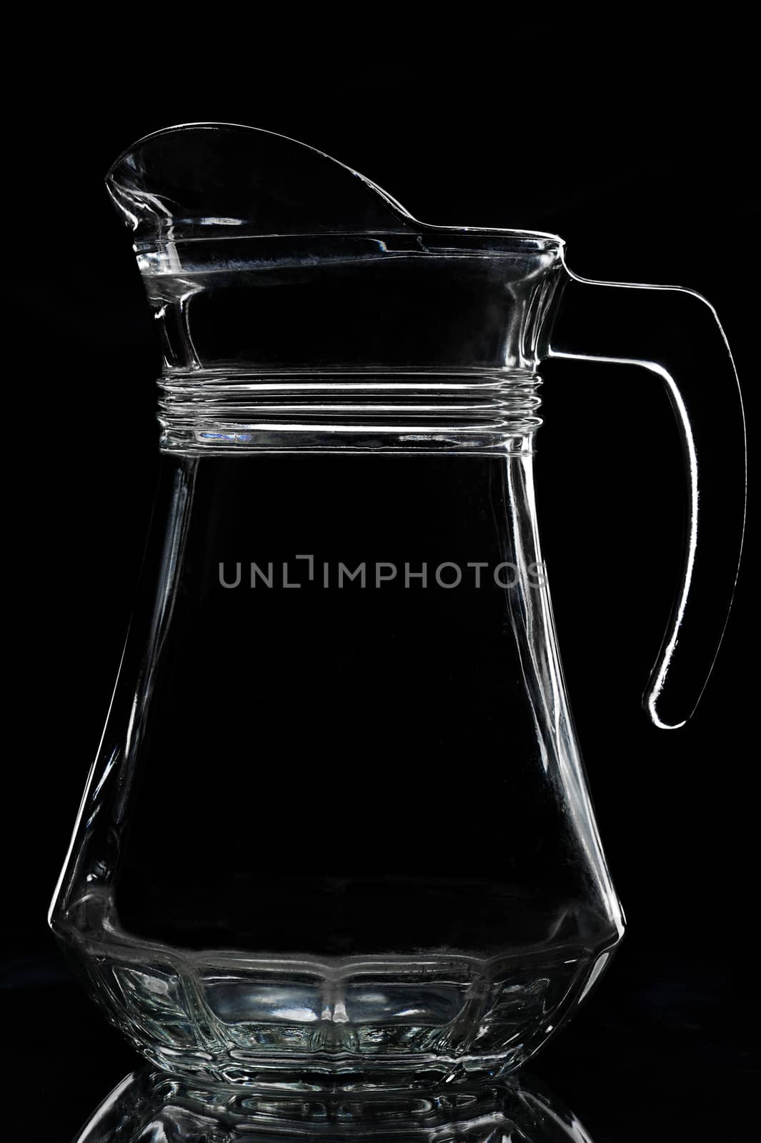 silhouette of empty jug on a black background