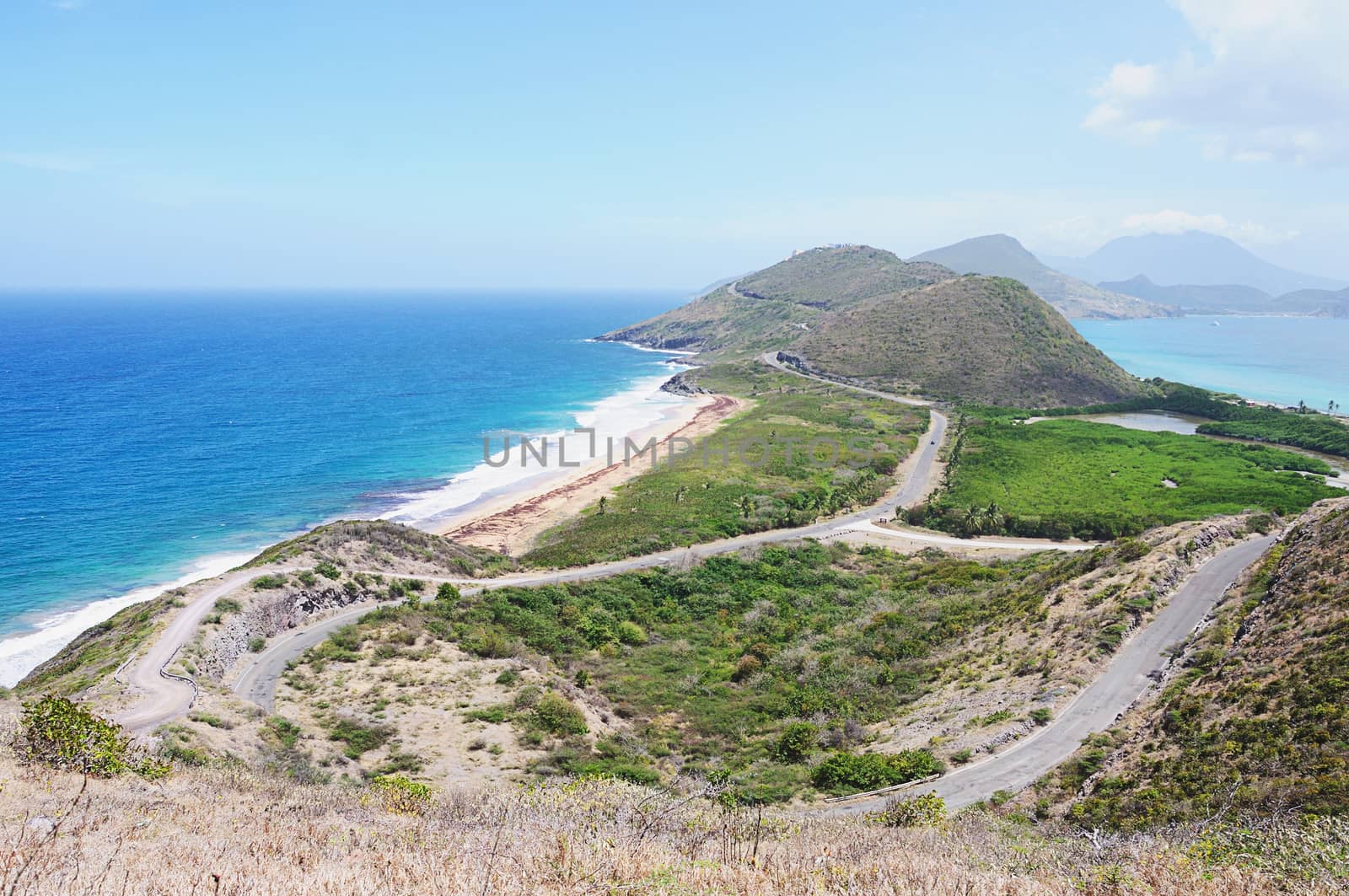 Caribbean beach in sunny day from aerial view