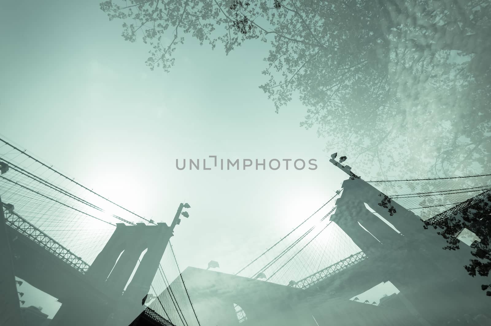 Double exposure photograph of Manhattan bridge