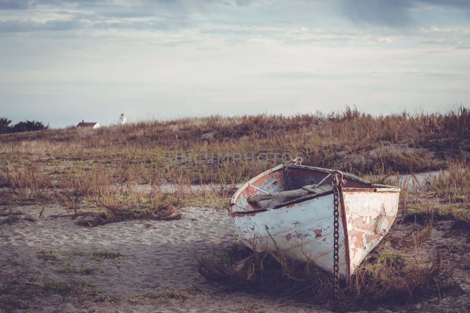 An old rowboat sits on a beach near Port Townsend, Washington ,USA