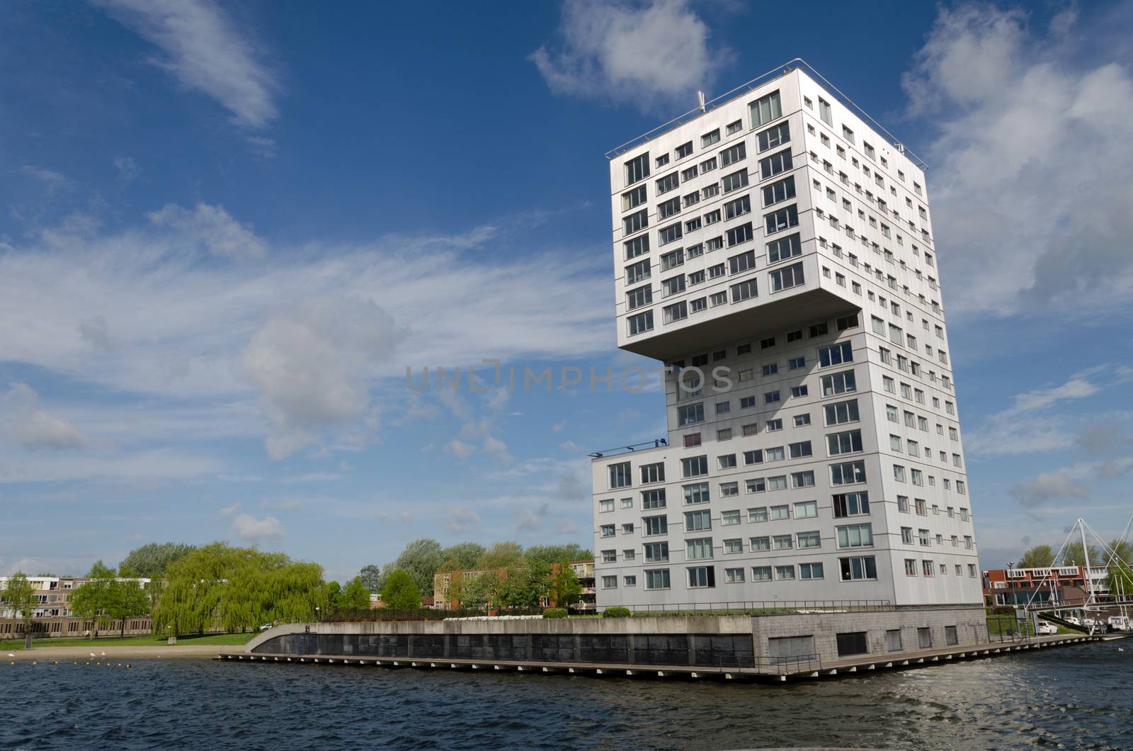 Modern apartment building at Weer water in Almere Stad, The Netherlands 