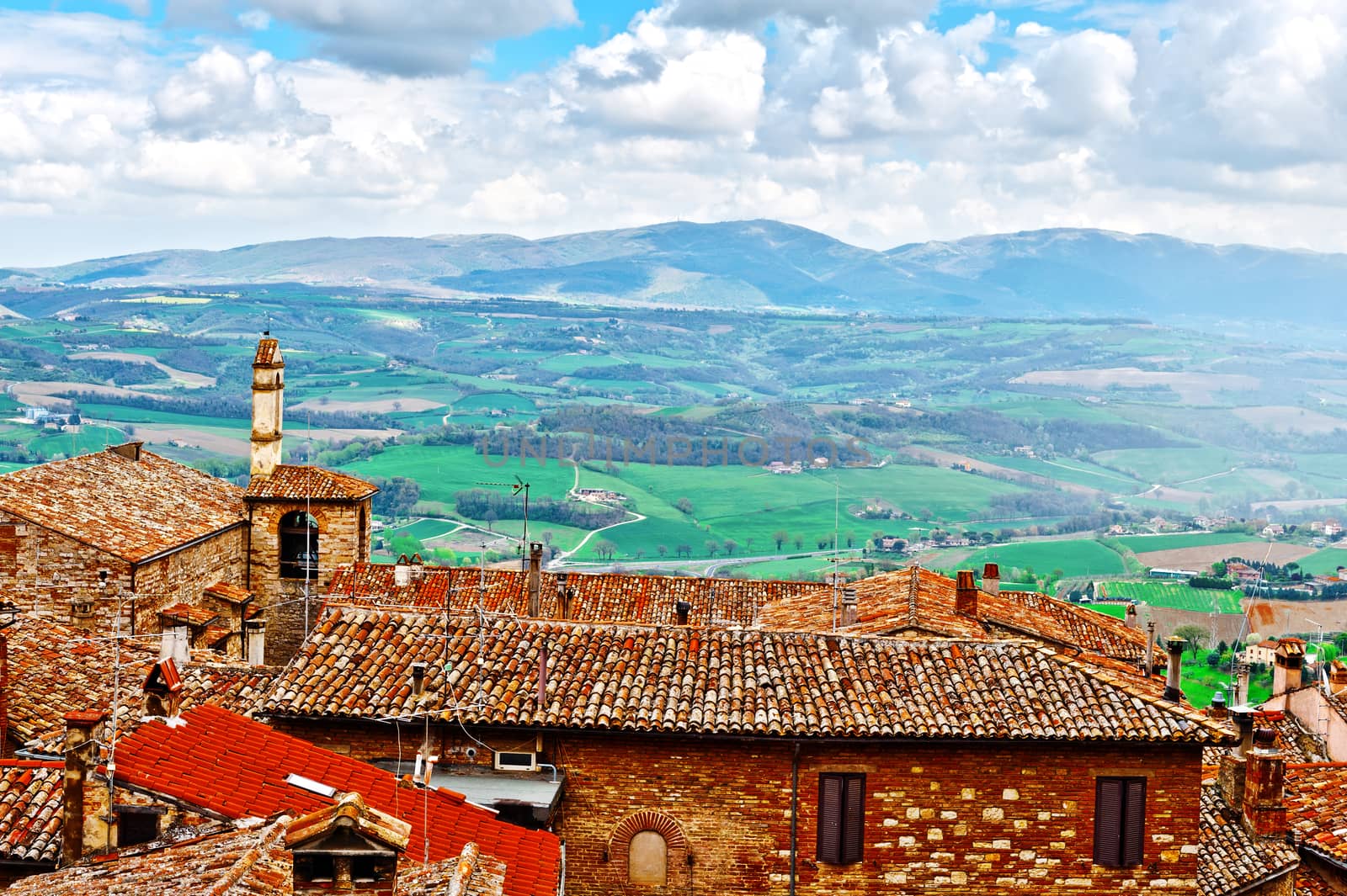 Aerial View of the Italian Medieval City  and Surrounding Tuscan Landscape 