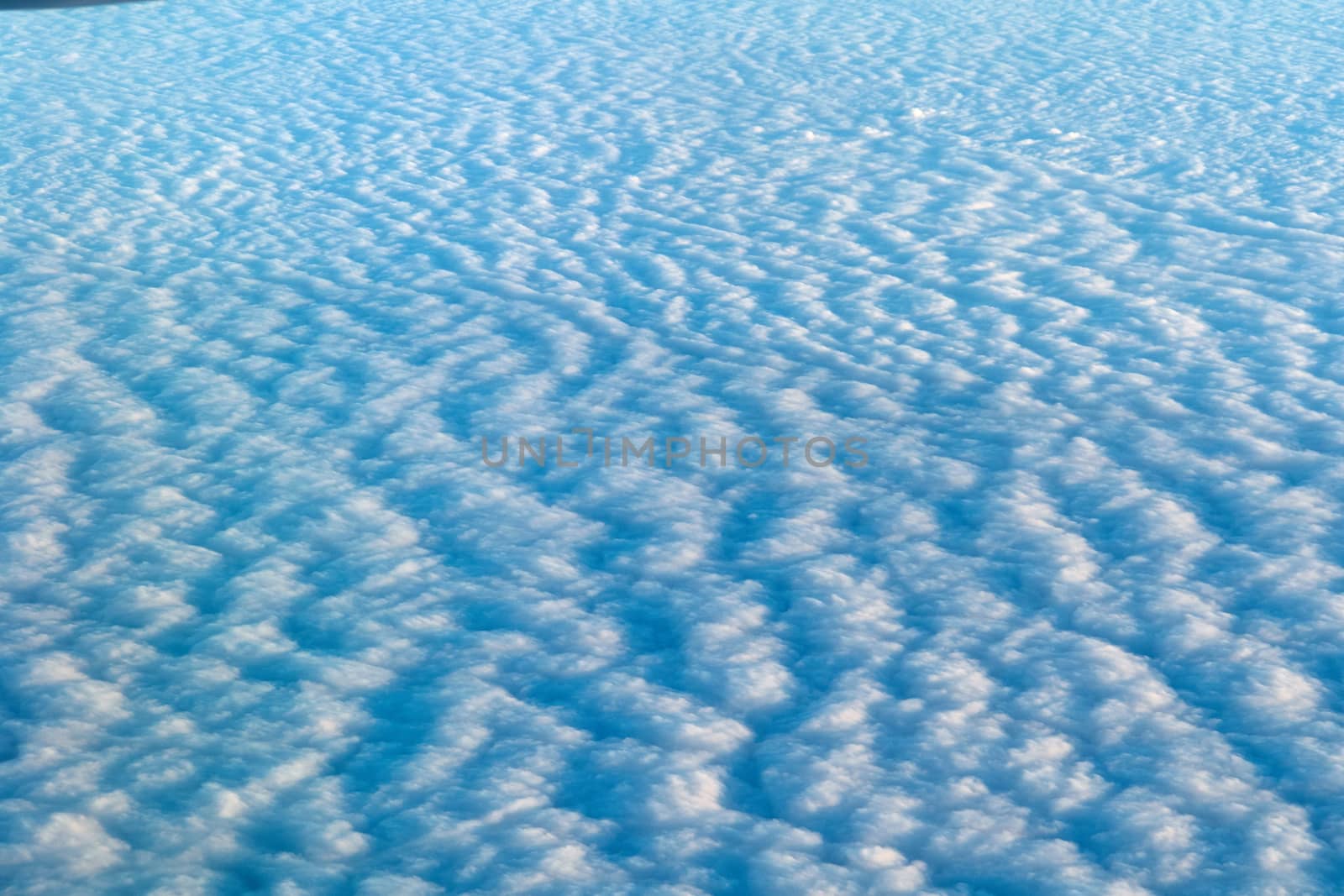 Flying above the clouds cloudscape travel tourism background image                              