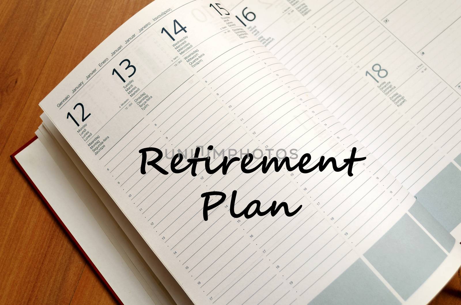 Retirement plan text concept write on notebook with pen