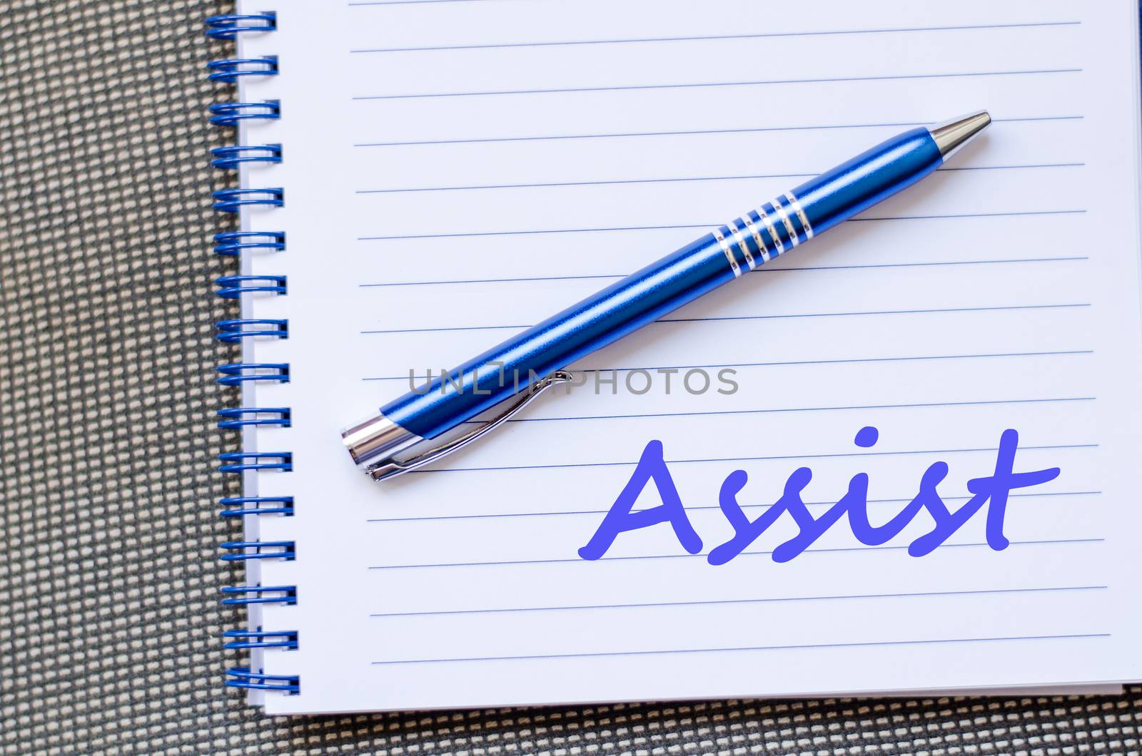 Assist text concept write on notebook with pen