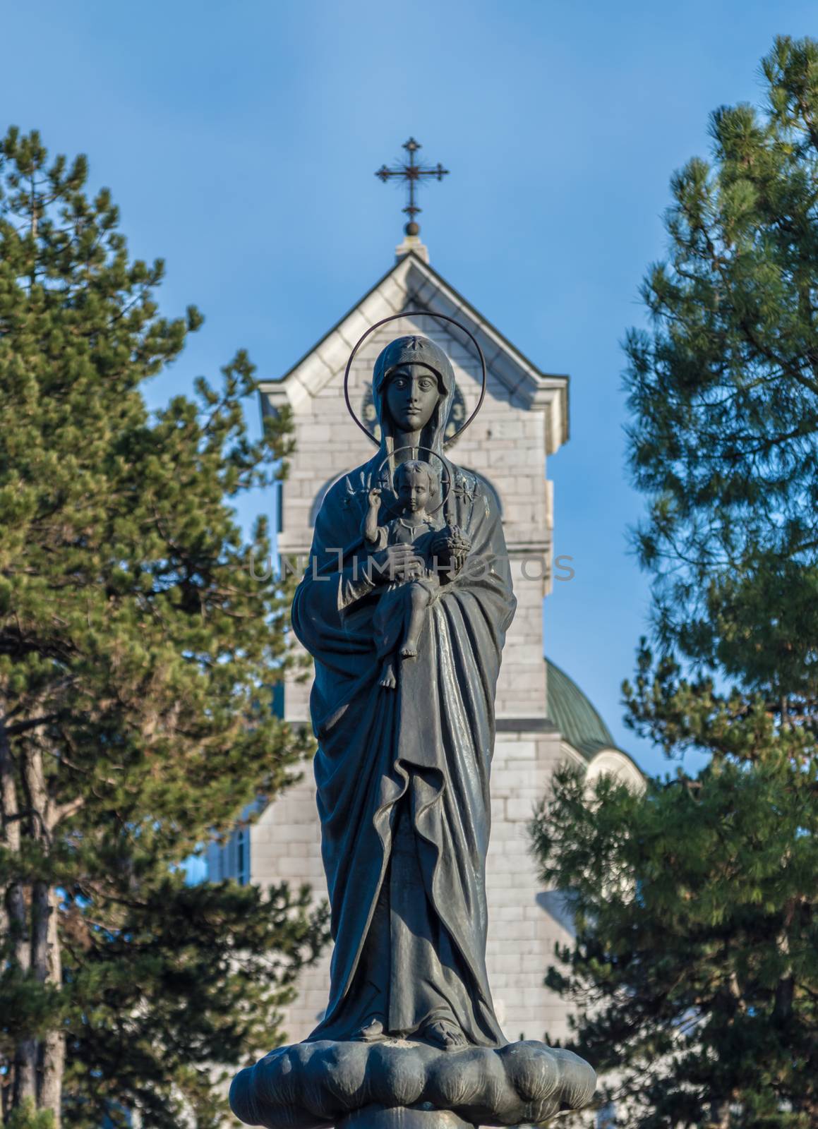 Virgin Mary carrying the baby Jesus by radzonimo