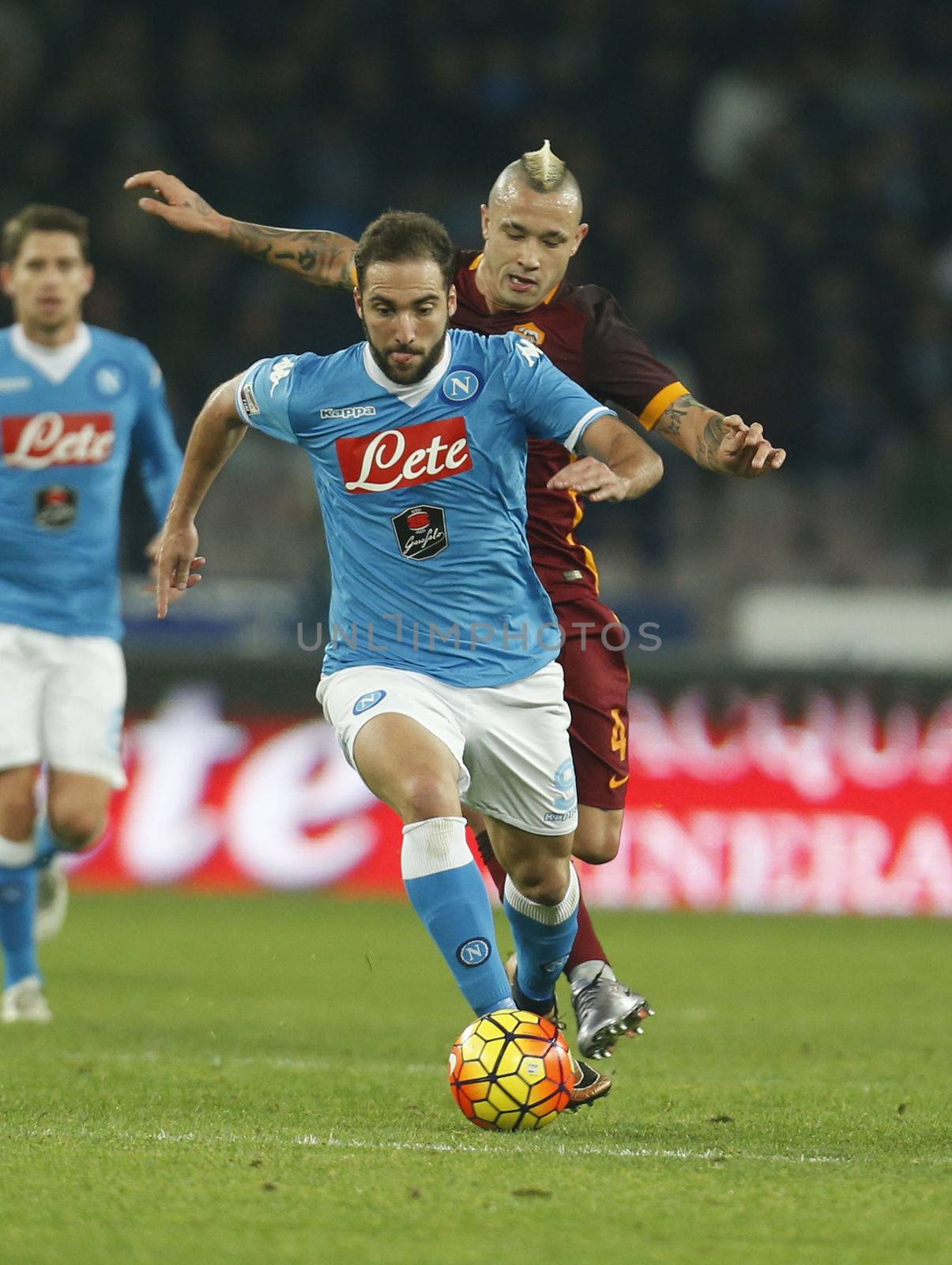 ITALY, Naples: Gonzalo Higuain of SSC Napoli controls the ball during a Serie A match between SSC Napoli and AS Roma at Stadio San Paolo in Naples, Italy on December 13, 2015. 