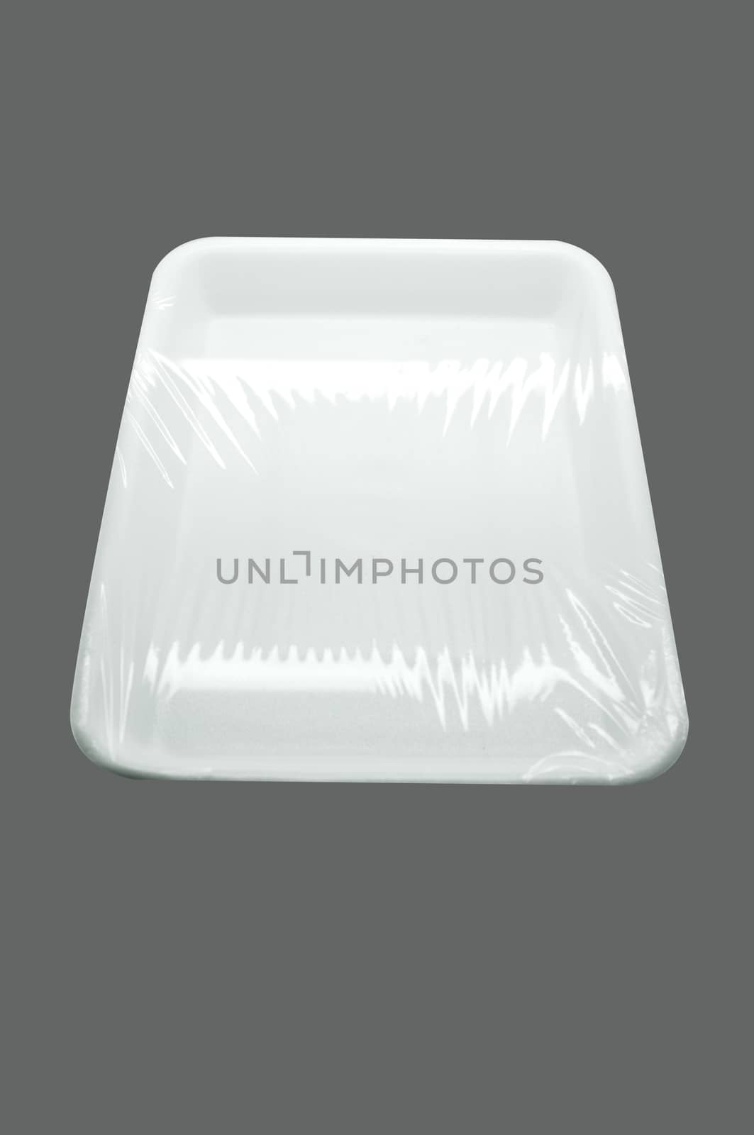 Wrapped white styrofoam food tray