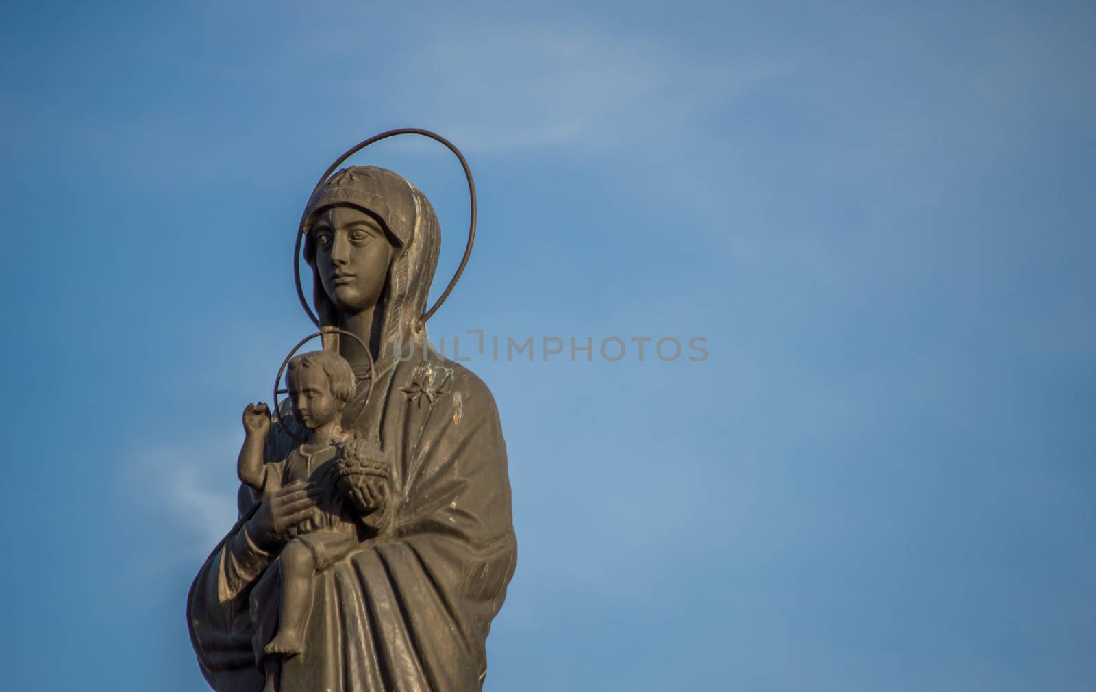 Virgin Mary carrying the baby Jesus by radzonimo