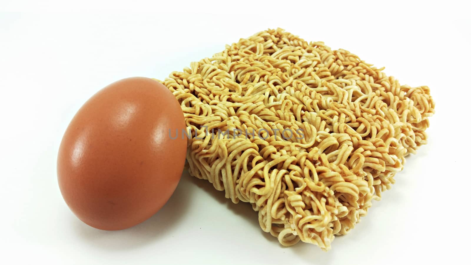 closed up dry instant noodle with fresh egg