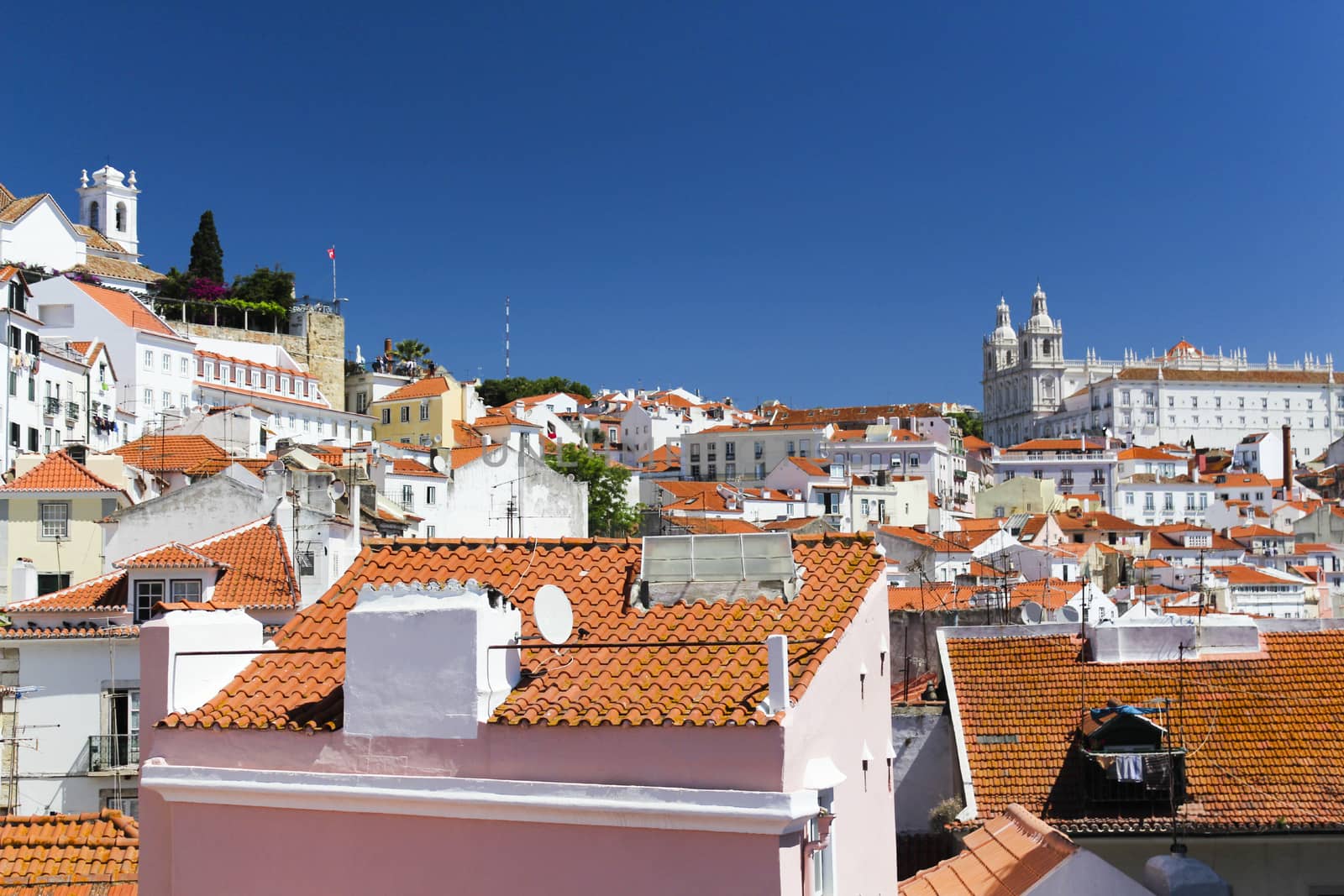 Vibrant rooftops of Alfama district in Lisbon in late spring
