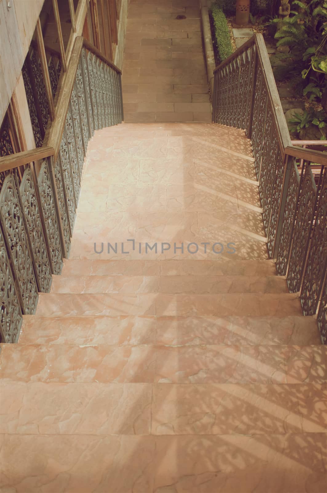 Old wooden down stairs step made from wood in vintage style.