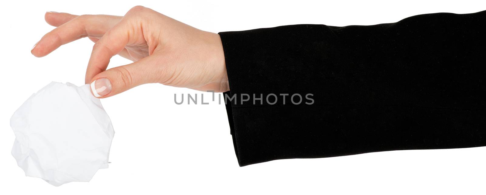 Female hand holding crumbled paper ball with two fingers on isolated white background, closeup